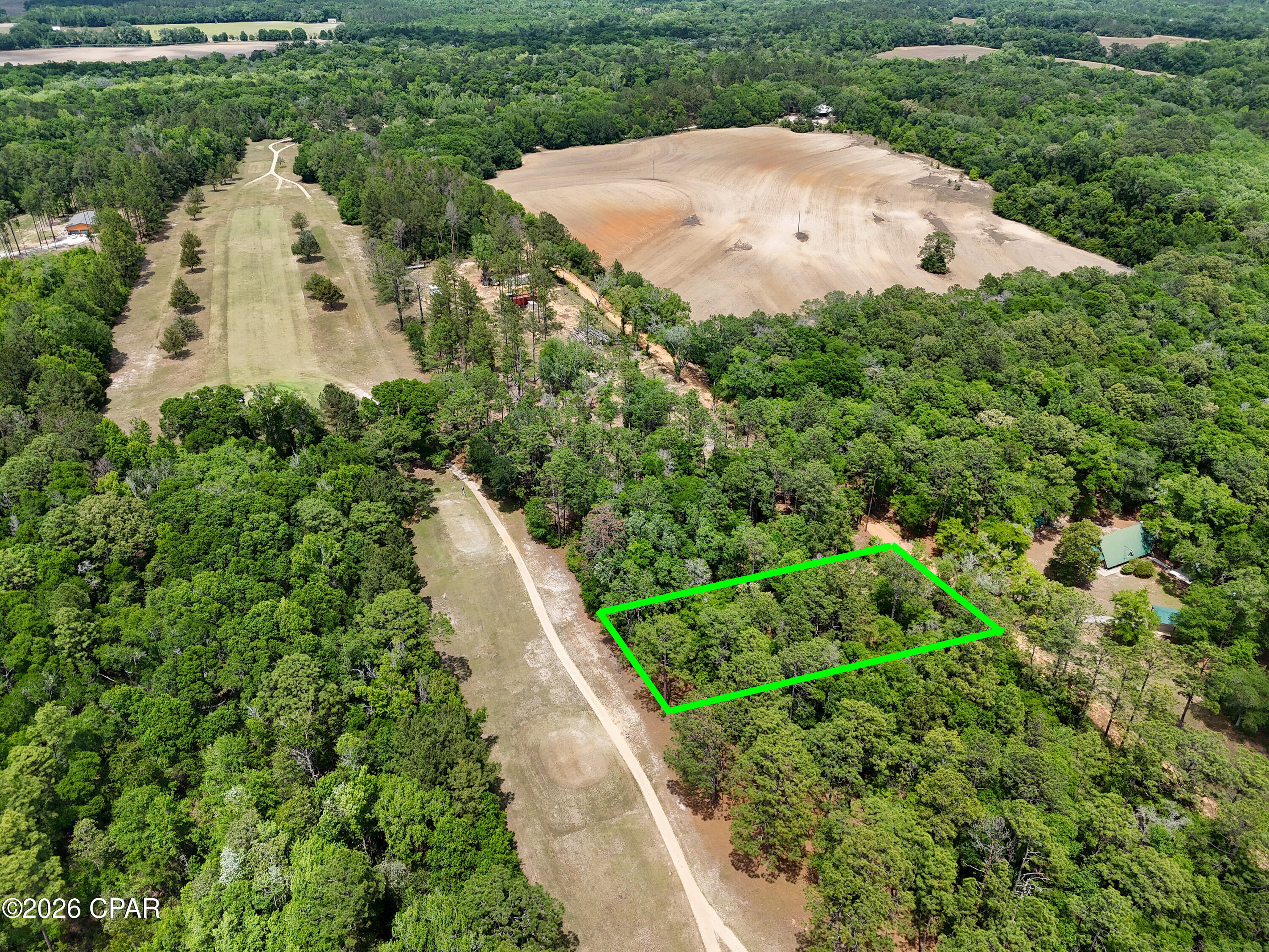 Welcome to Dogwood Lake Estates, where peaceful country living meets golf course beauty. This exceptional .41-acre parcel offers a rare opportunity to own expansive, golf course-front property in the quiet charm of Bonifay, Florida. With the scenic 18-hole course right at your back door, you'll enjoy wide-open views, privacy, and a setting that feels like a retreat every day.
Whether you're looking to build a private estate, recreational getaway, or investment property, this acreage provides endless potential. Tucked away in a serene part of the Florida Panhandle, yet still within reach of town conveniences, this is a unique chance to own a substantial piece of land in a truly tranquil setting.
Both Olive Lane and 2724 Muir Lane are non contiguous lots that can be sold as a Package Deal.