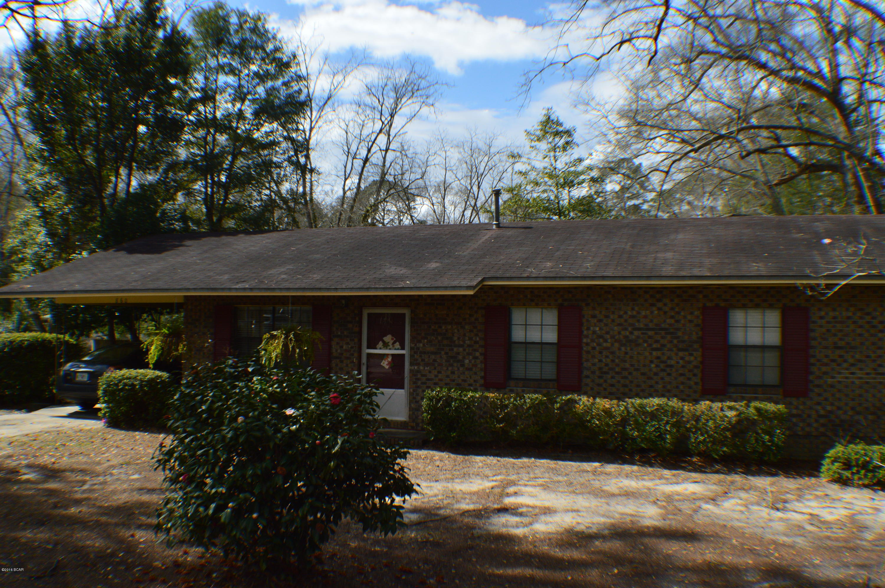 Cute Home in Town!!!! Walking distance to shopping and park. Ranch style brick home with 3 bedroom and 1 bath. Open floor plan with Living open to Dining/Kitchen. spacious utilty room just steps away. Home has been freshed up with lighting, paint, and much more... Nice size deck overlooking large fenced in back yard. Won't last long!!!!!