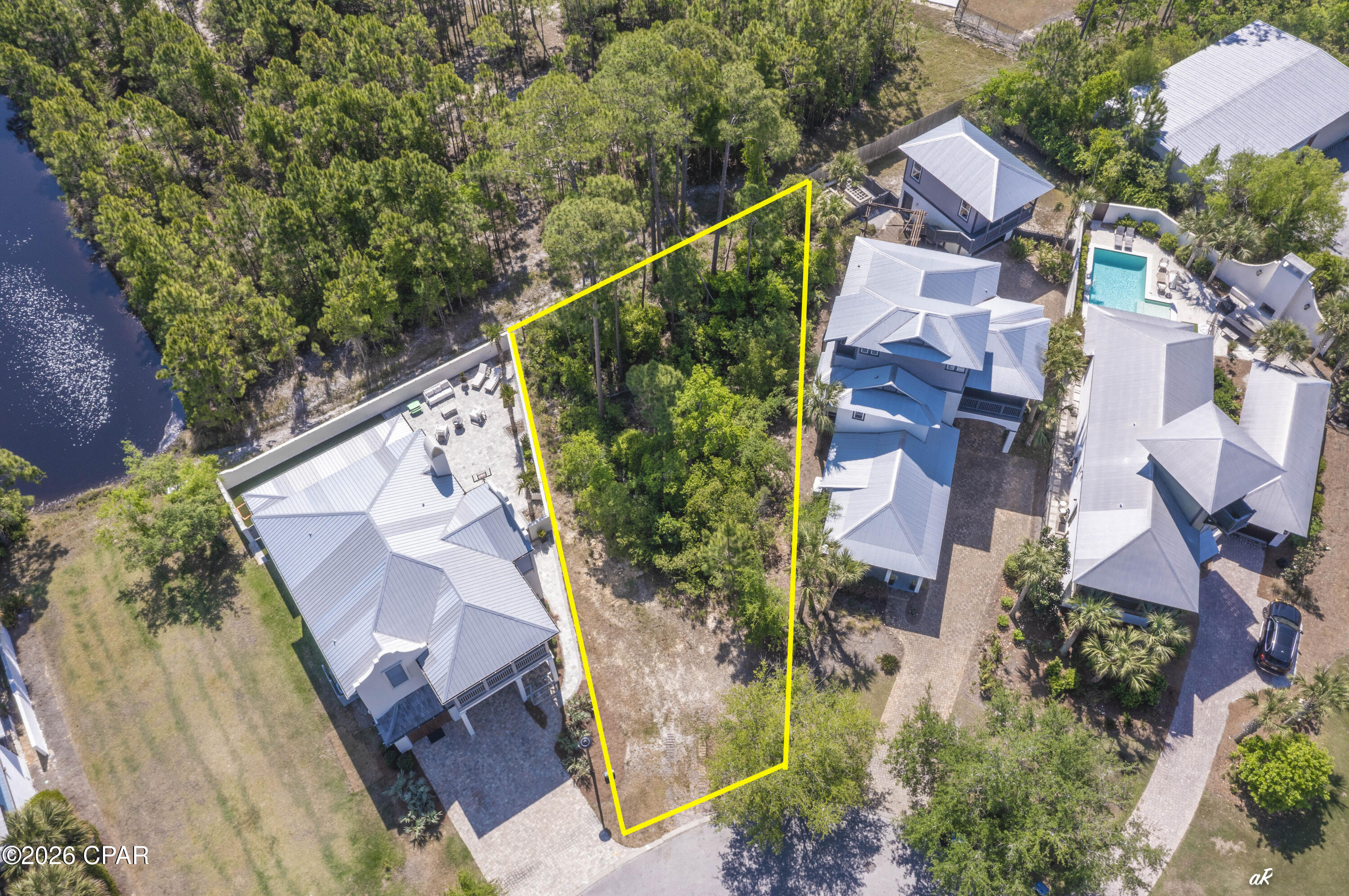 Build your dream home at 5309 Hometown Lane in the exclusive, gated community of Martinique! Located on the quiet East End of Panama City Beach, Martinique is highly sought after for its classic ''Old Florida'' charm, peaceful nature trails, and freshwater lakes. It's a very golf-cart-friendly neighborhood packed with great amenities, including an island-style community pool, a pavilion, a playground, and a basketball court.

The location is unbeatable. You're just a short ride away from the white-sand beaches of St. Andrews State Park, the Grand Lagoon, Lighthouse Marina, and local waterfront staples like Captain Anderson's and The Grand Marlin.

This is a great opportunity to secure a prime, buildable lot in one of PCB's best neighborhoods.