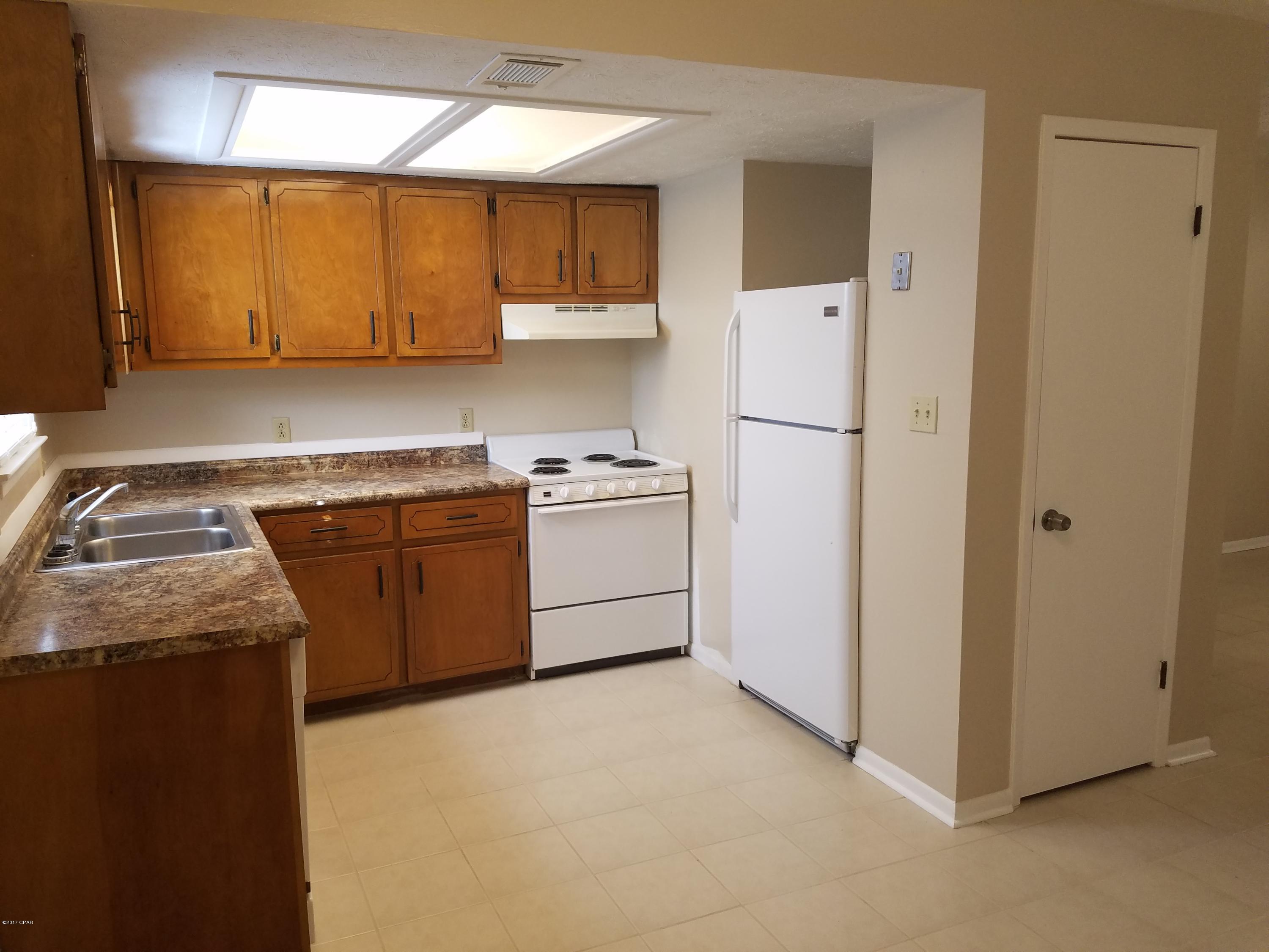 For rent. 2 BR, 1 BA on the first floor centrally located near Front Beach/Middle Beach corridor. Kitchen updated with new counter tops and stained cabinetry, includes Refrigerator, stove/oven, dishwasher, Clothes Washer/Dryer. All ceramic tile throughout the unit. Bathroom has a tub/shower combination and updated vanity. **No Pets Allowed. Rent includes garbage and lawn maintenance.