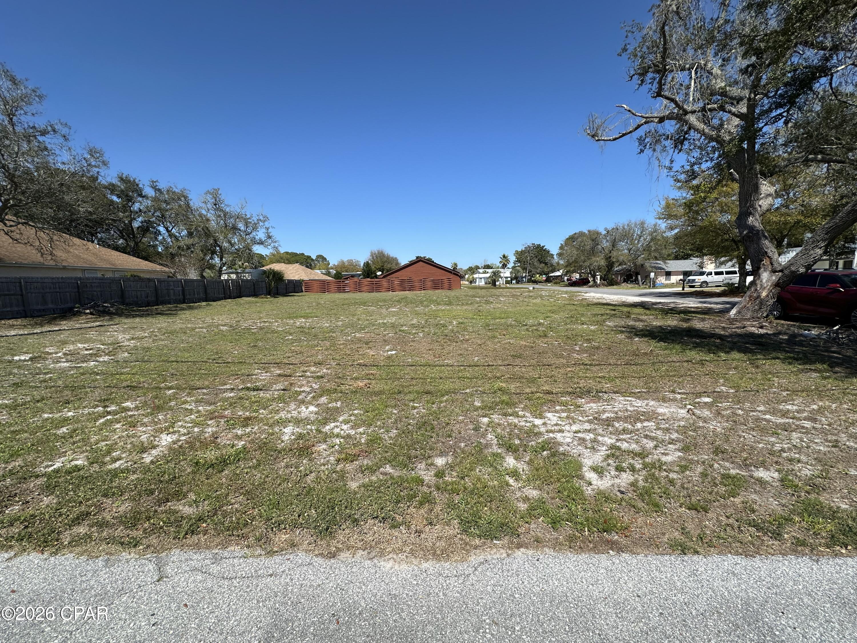 Discover an exceptional opportunity to build your dream home in the highly desirable North Lagoon Drive area of Panama City Beach. This spacious .26-acre parcel offers the perfect setting for a custom coastal retreat, with the potential for beautiful water views from a two-story design.

Ideally located just minutes from beach access, shopping, dining, golf courses, and all the entertainment at Pier Park, this property also provides convenient access to the PCB Navy Base and St. Andrews State Park. Boating enthusiasts will love being within 2 miles of nearby marinas and boat launches, making bay access quick and easy.

One of the last remaining lots in this sought-after subdivision, this property offers added value with no HOA and is located in Flood Zone X. Please note: multifamily construction is not permitted.

Don't miss your chance to secure a prime piece of paradise and bring your beach home vision to life.