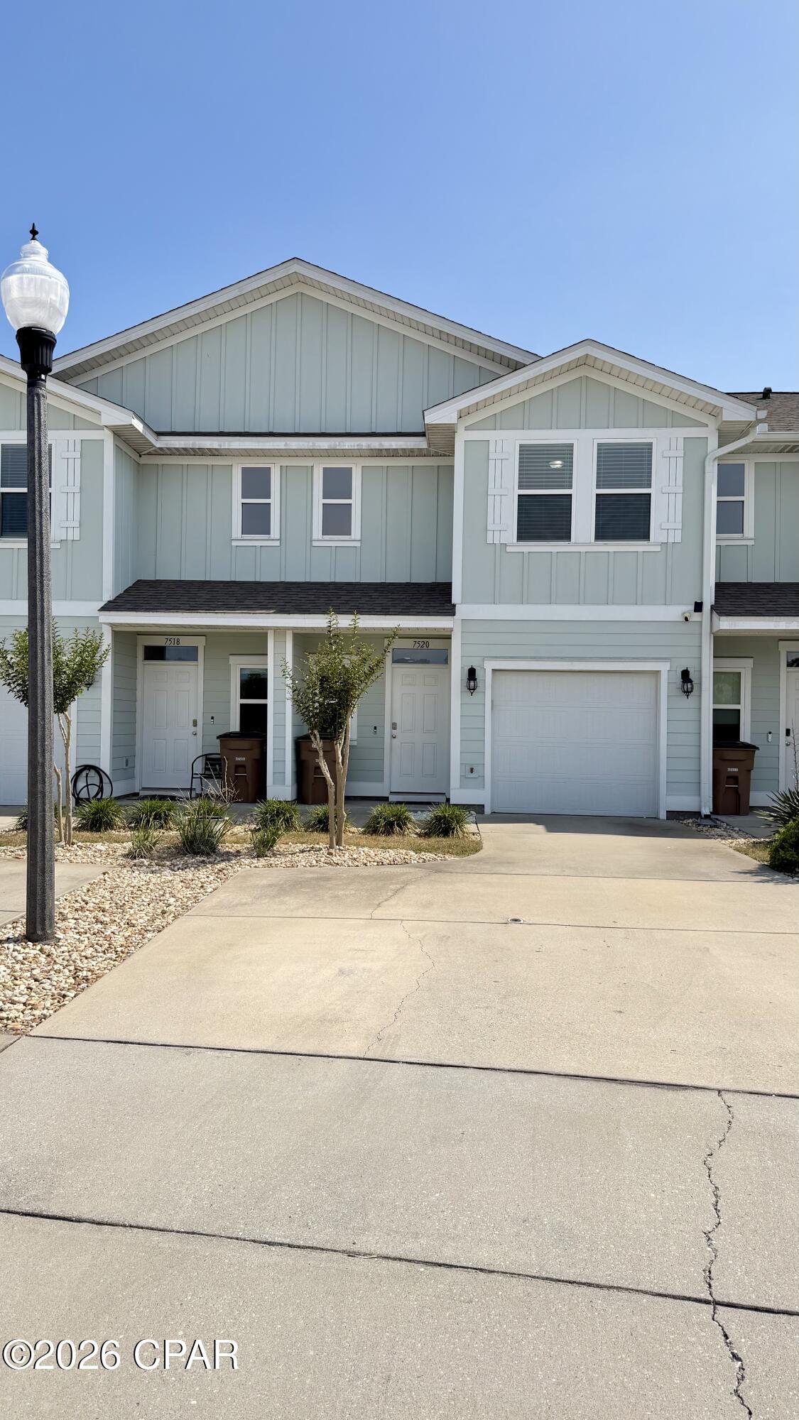Trash service and lawn care are included, making for easy, low-maintenance living from day one. Ideally located directly across from the community pool, this unfurnished 3-bedroom, 2.5-bath townhome also offers a peaceful lake view from the primary bedroom--bringing both convenience and a touch of serenity to your daily routine.

Step inside to a bright, open-concept layout filled with natural light and designed for comfortable living and entertaining. The modern kitchen features granite countertops, stainless steel appliances, and ample cabinet space, flowing seamlessly into the main living area. Upstairs, you'll find generously sized bedrooms with plenty of storage, including a private primary suite overlooking the community lake. A one-car garage and private driveway provide convenient parking and additional storage.

This well-maintained home offers comfort, functionality, and a prime location--perfect for those relocating or seeking a long-term rental in a desirable community. Washer and dryer are included, and residents enjoy access to the community pool just steps away.

Offered at $2,100 per month with a security deposit equal to one month's rent and a preferred 12-month lease. Tenant is responsible for water, electricity, and internet. Pets will be considered with a maximum of two, subject to a $25 monthly fee per pet and a $250 non-refundable fee per pet.