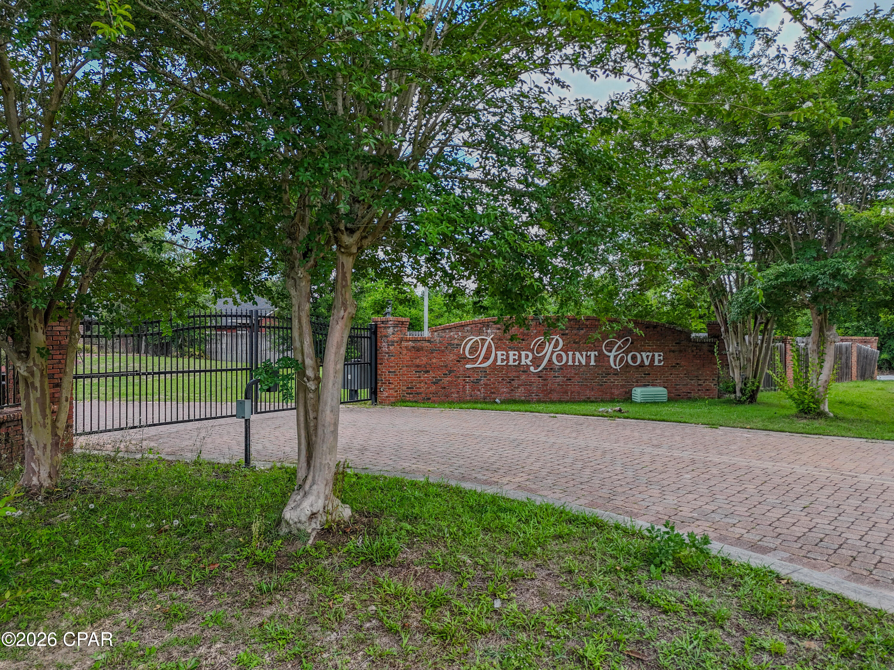 4407 Deer Point Cove presents the perfect opportunity to build your custom dream home in one of the area's desirable gated communities near Deer Point Lake. This oversized vacant homesite offers a peaceful setting surrounded by natural beauty and established homes, while still allowing you the freedom to create a property tailored to your vision. The lot has not yet been cleared, giving buyers a blank canvas to design exactly what they want from the ground up. Deer Point Cove features neighborhood covenants and restrictions that help preserve the community's appeal and long-term value. Property will require well and septic installation. Conveniently located near public boat ramps, outdoor recreation, shopping, dining, and local schools, this property offers the ideal blend of privacy, flexibility, and location. Call a REALTOR® today to schedule a private tour. If important, buyer to verify all measurements and restrictions. No survey available.