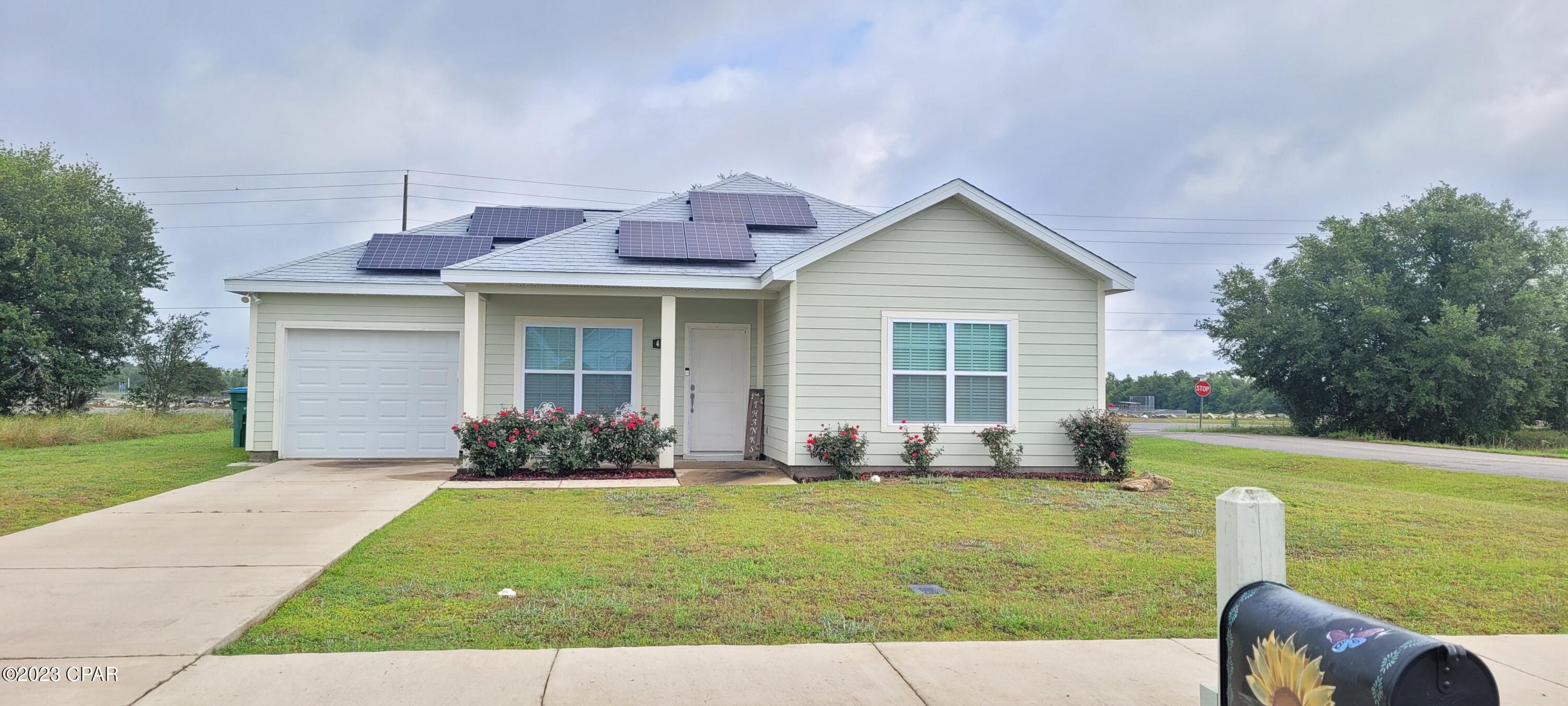 STOP Looking!! Here is the perfect house for your family!! Immaculate 3 Bedroom 2 Bath home with 1101 sq ft. Home is 3 years new, and is just waiting for you! Located on a corner lot with plenty of room for the kids to play, while you relax on the back porch. The home has an open split bedroom floorplan. Nice sized rooms with no carpeting in the entire home!! The Kitchen has plenty of cabinet space and solid surface countertops with a breakfast bar and island. The Attached 1 car garage gives you the needed storage space and the home has no wasted space!! The home has solar panels with electric bills only $20 per month!! This home is located close to MK8 & Marianna High school, and in walking distance to the MERE sports complex. The perfect location for your family!! This home will NOT last long at this price so call today for your private showing!!