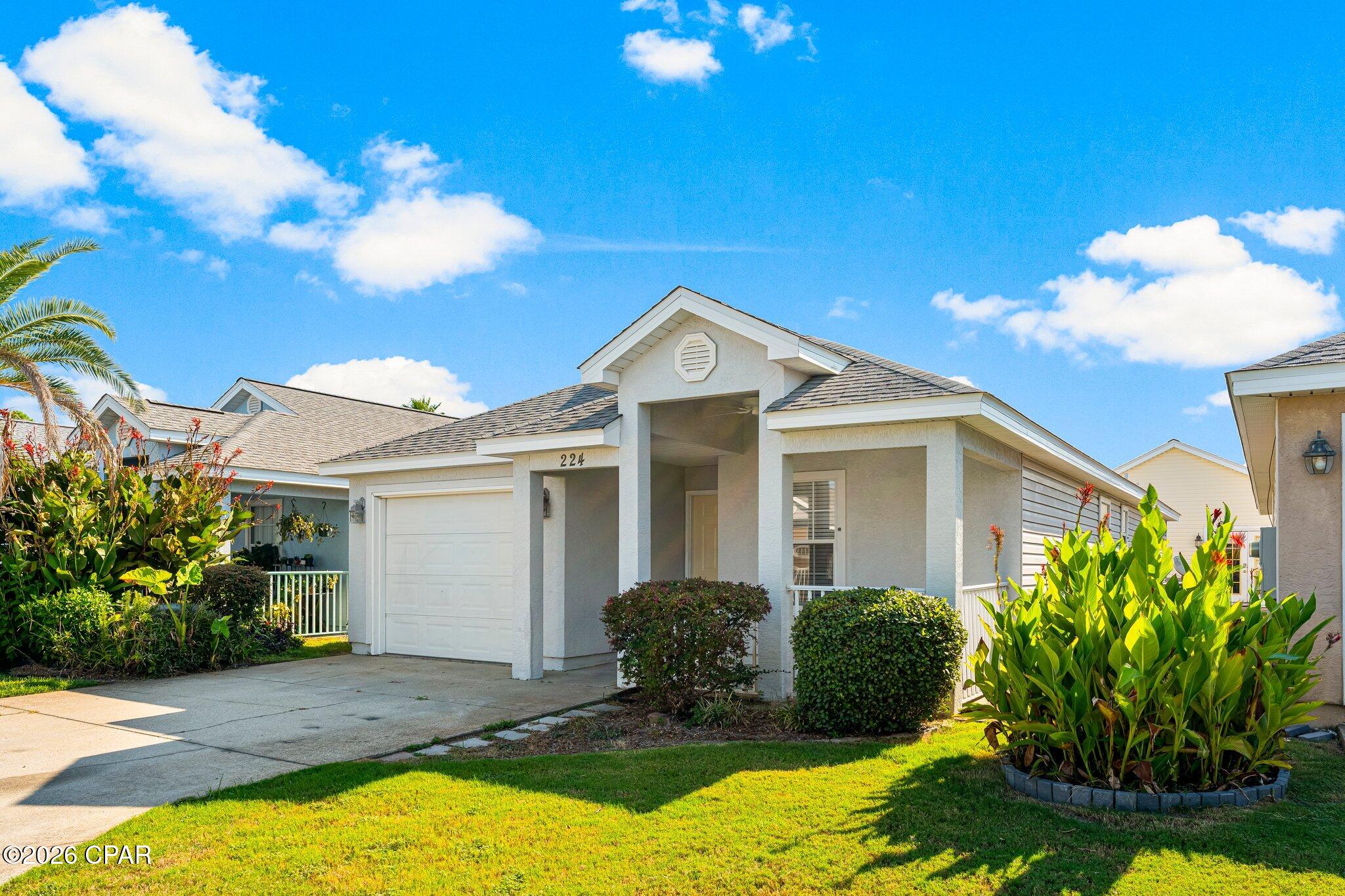 New Roof Oct 2025. Come and see this beautiful completely furnished 3 bedroom 2 bath home with single car garage in Palm Cove. Just 2 blocks from the beach. Move in ready as your primary home or vacation rental. Short term rentals allowed.