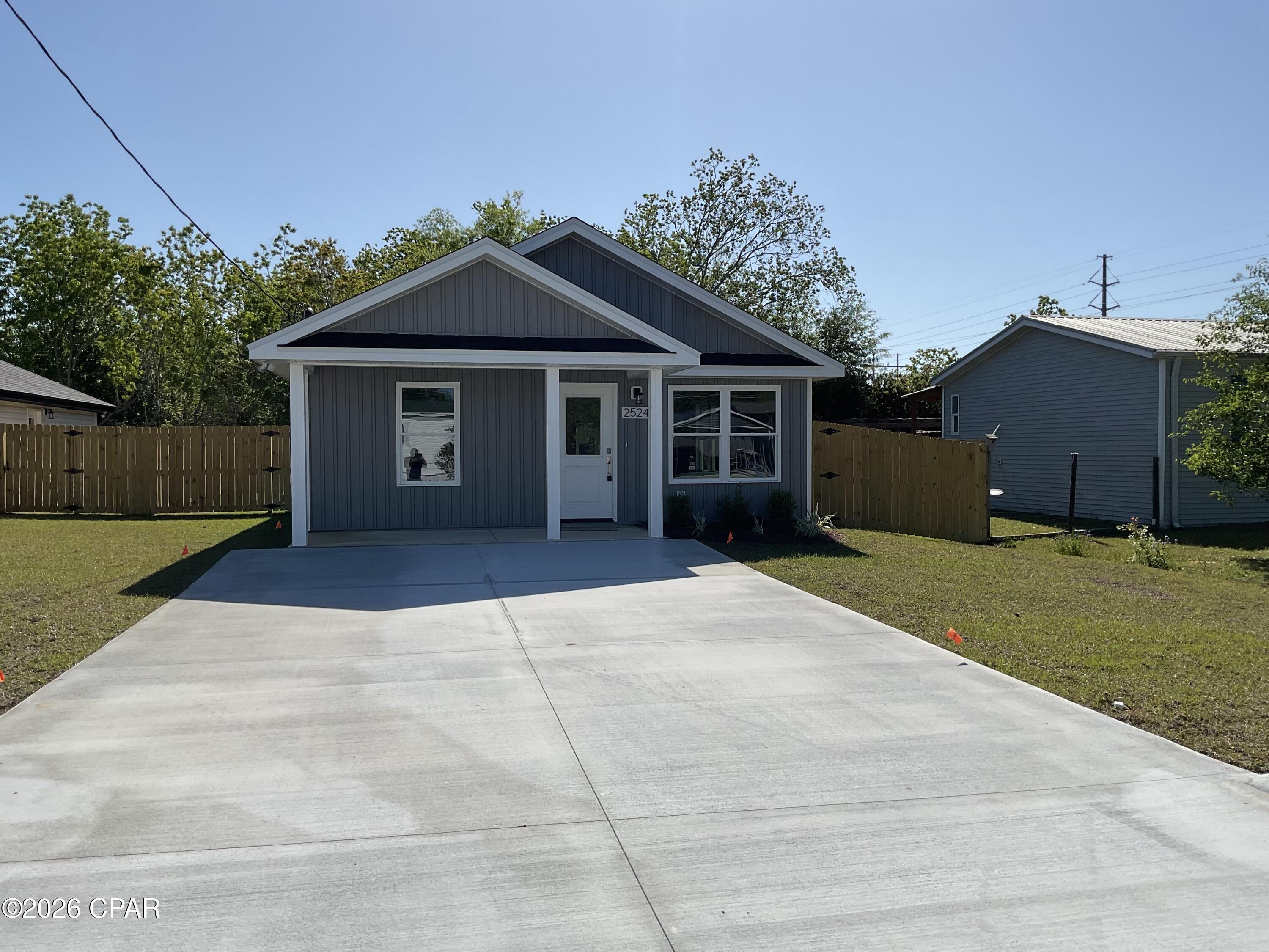 New 3 bdrm 2 bath home with LVP and cathedral ceilings in the living area.  Nice kitchen with granite breakfast bar.  Lovely starter home with two bathrooms and a partially fenced yard.  It is just off Hwy 231 with great access to shopping and places of interest.  Just 1.2 miles to 23rd Street for all your shopping needs. Large living dining area provides space for the family to gather.