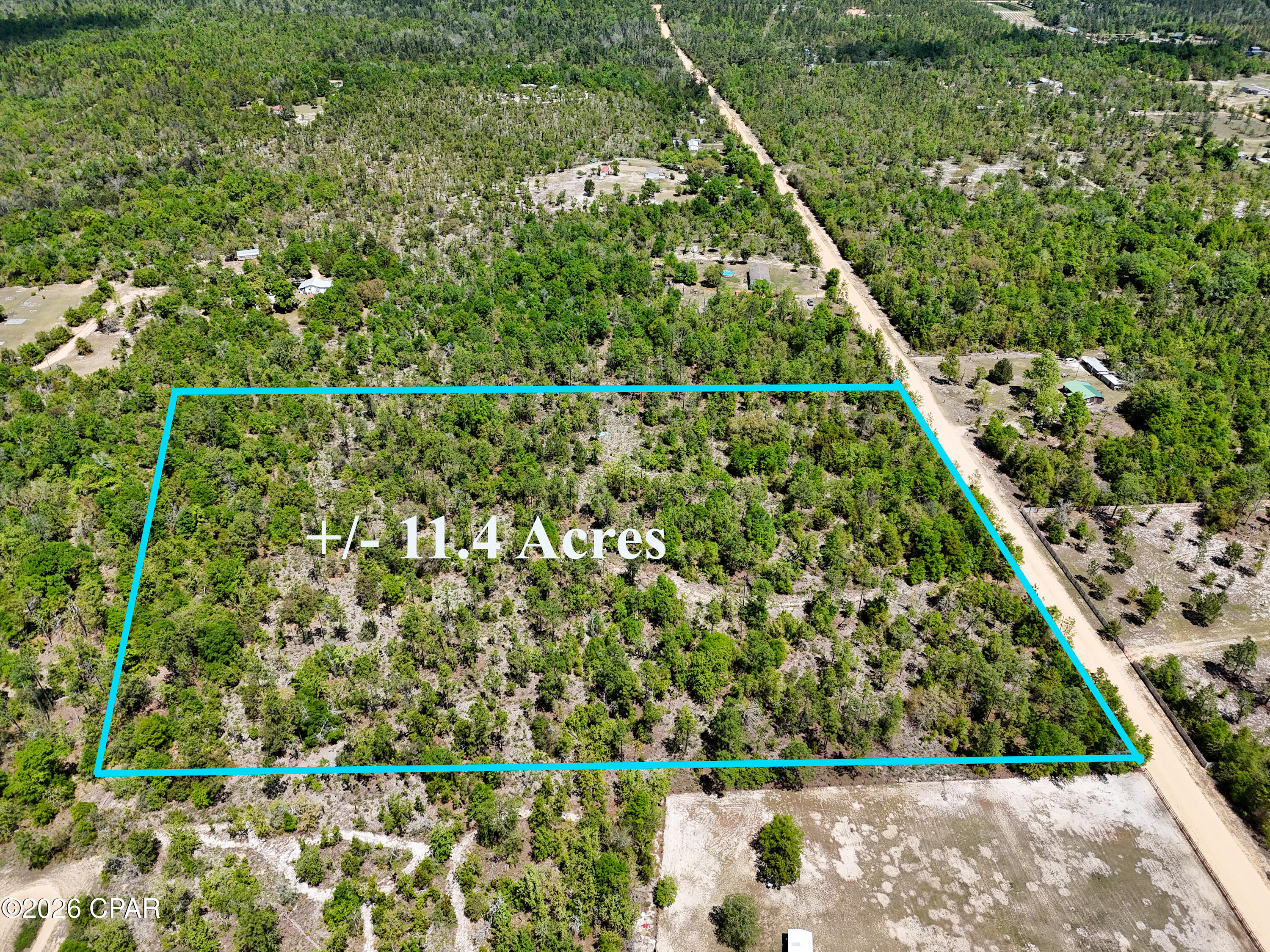11.4 acres of privacy and seclusion! Bring your horses or farm animals. Build your dream home or place a manufactured home on this high and dry property. Located less than 2 miles off Highway 231, this property is perfect for anyone needing a little ''elbow room'' or wants a mini farm. There was a double wide on the property. The well head is still there (see pictures) and there should be a septic tank on the property as well. The property is only 35 minutes from shopping, dining, and the world's most beautiful beaches, this land is priced to sell!