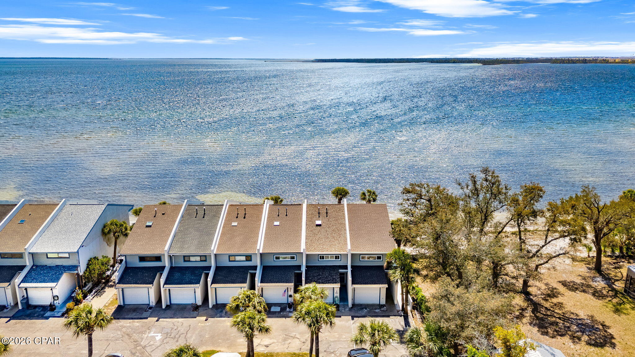 Seller will contribute $5,000 towards Buyers closings costs! 

Welcome to Sunbay Townhomes, a rare chance to own a versatile property with prime visibility and beautiful water views in Panama City. Perfectly positioned along a high-traffic corridor, this property offers endless potential whether you're looking for a primary residence, investment opportunity, or a unique live/work setup.

Enjoy stunning sunrises over the water and the convenience of quick access to Tyndall Air Force Base, shopping, dining, and downtown Panama City. 

Inside, the home features a functional layout ready for your personal touch. Large windows invite in natural light and showcase the peaceful surroundings, while the outdoor space offers plenty of room to relax, take in the coastal breeze while you walk on the beach.

Whether you're an investor, business owner, or homeowner looking for a property with character and potential, this one checks all the boxes.

Don't miss your chance to own a piece of the coast with high visibility and endless possibilities, book your private showing today.
