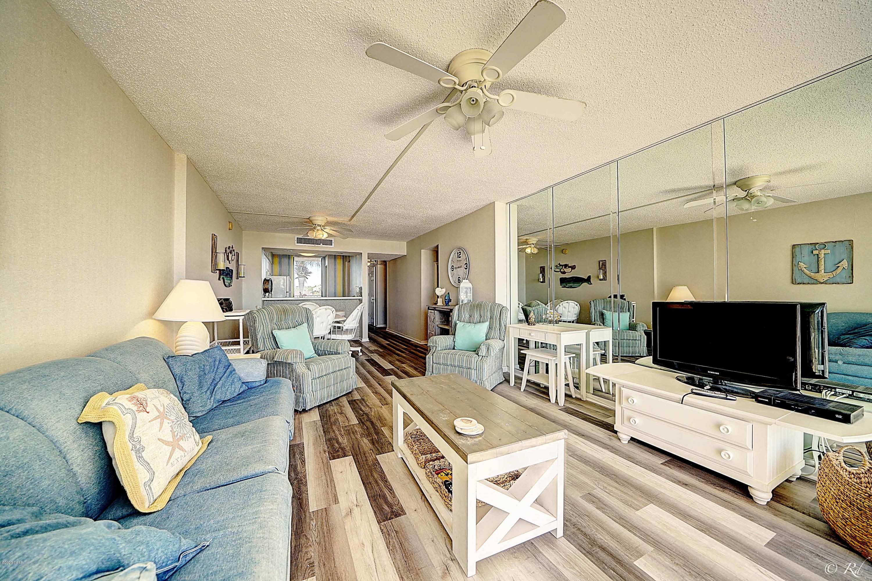 Beautiful 2 Bedroom, with great views of the gulf. Master bedroom has view as well. Large open floor plan, with breakfast bar. All floors are brand new & look amazing. This property would be great as a rental investment. However, this owner has not rented, since he's owned here. Dunes of Panama has 3 pools, tennis, shuffleboard, fitness room and a place to grill. Great ammenities for the entire family. This complex is in walking distance to shoping & restaurants.