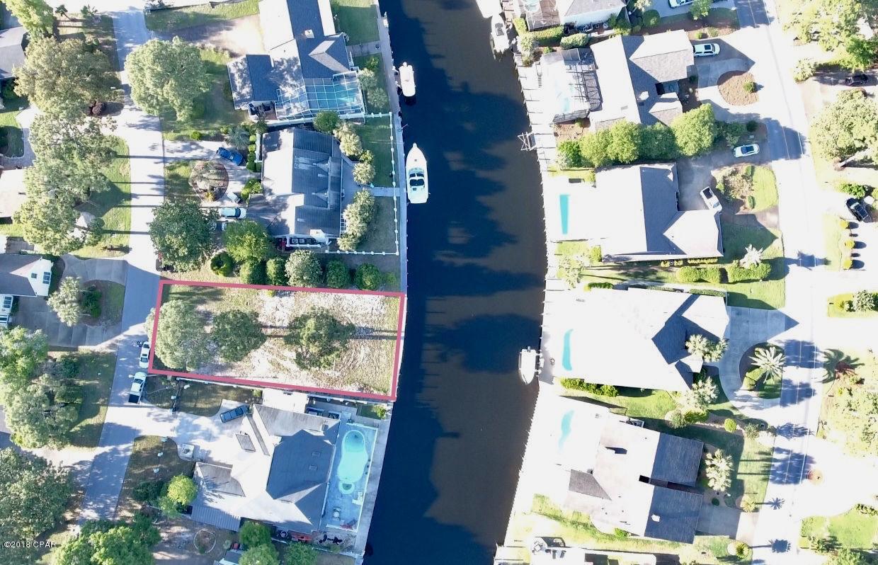 BAY POINT WATERFRONT LOT WITH QUICK ACCESS TO THE GULF OF MEXICO.  BUILD YOUR DREAM HOME ON ONE OF THE LAST CANAL FRONT LOTS IN THE MUCH DESIRABLE NEIGHBORHOOD OF BAY POINT! This lot features 92 front feet on the canal with a vinyl seawall in place. The Bay Point Community is one of the most sought after neighborhoods providing residents with 24 hour Security, Restaurants, 2 Championship golf courses-including the only Nicklaus Design course in Northwest Florida, Sidewalks, On-site marina, Tennis courts, and much more.