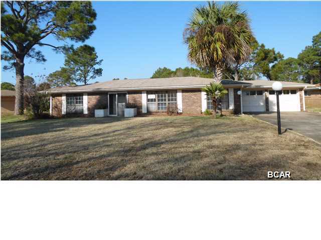 A lovely large home, located on the Bayou in Lynn Haven's desirable NorthShore. This home boasts 4 bedroom and 2 baths and will be a great source of entertainment for those who enjoy outdoor activities such as boating, fishing and sunbathing by the inground pool. The waterfront dock features a covered boat slip and lovely views down the canal water way, which provides direct access to North Bay, St Andrews Bay, the Intercoastal Waterway, the Pass and the Gulf of Mexico. This one is move-in ready and at this price, it will go fast, so don't delay! (All info, dimension, etc, is approximate and should be verified by buyer, if important.)