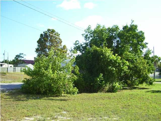 Great vacant lot on the south side of Hwy 98 in Laguna Beach on the west end of Panama City Beach, FL. Get it while you can! There are three lots for sale right next to one another. Buy all three and the price will get even more negotiable. Seller is ready to sell. Bring the offer today! (all information approximate, if important please verify)