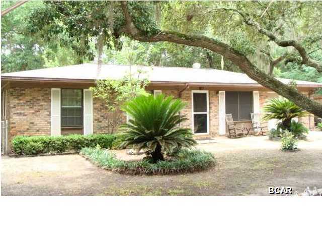 This home is nestled amongst the beautiful mature oaks of St Andrews. Just a few blocks from the bay. You can walk to St Andrews marina.. Uncle Ernies and so much more in Historic St Andrews. This property is not in a flood zone so you can save on Insurance. This property was upgraded in 2006 with new central air unit new 35 year roof shingles..storm windows and doors. There is a rear alleyway owned by the city you can use to access your back yard. Inground sprinkler system that runs off its own well..This is a must see home with so much more!!!All sizes are approximate, if they matter to you, please measure.