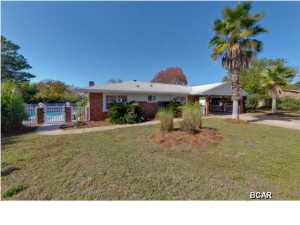 This is a bright, cheery, happy home with lots of natural light and a beautiful saltwater pool. Located approximately 2.5 blocks from beautiful, dedicated Laguna Beach. The pride in ownership shows in the meticulously maintained 1,408 square feet of living space and the manicured yard. 3 Bedrooms, 2 baths, huge eat-in kitchen, great room with fireplace, beautiful hardwood floors, casual beachy decor, etched glass mirrors, the features go on and on. You really have to see this house to appreciate it. Double carport with workshop and storage, outdoor shower, lots of patio space, new windows and doors... Beautiful saltwater pool off the great room with with plenty of space for catching rays and having cook-outs. Saltwater filtration system installed on fiberglass pool last year, new