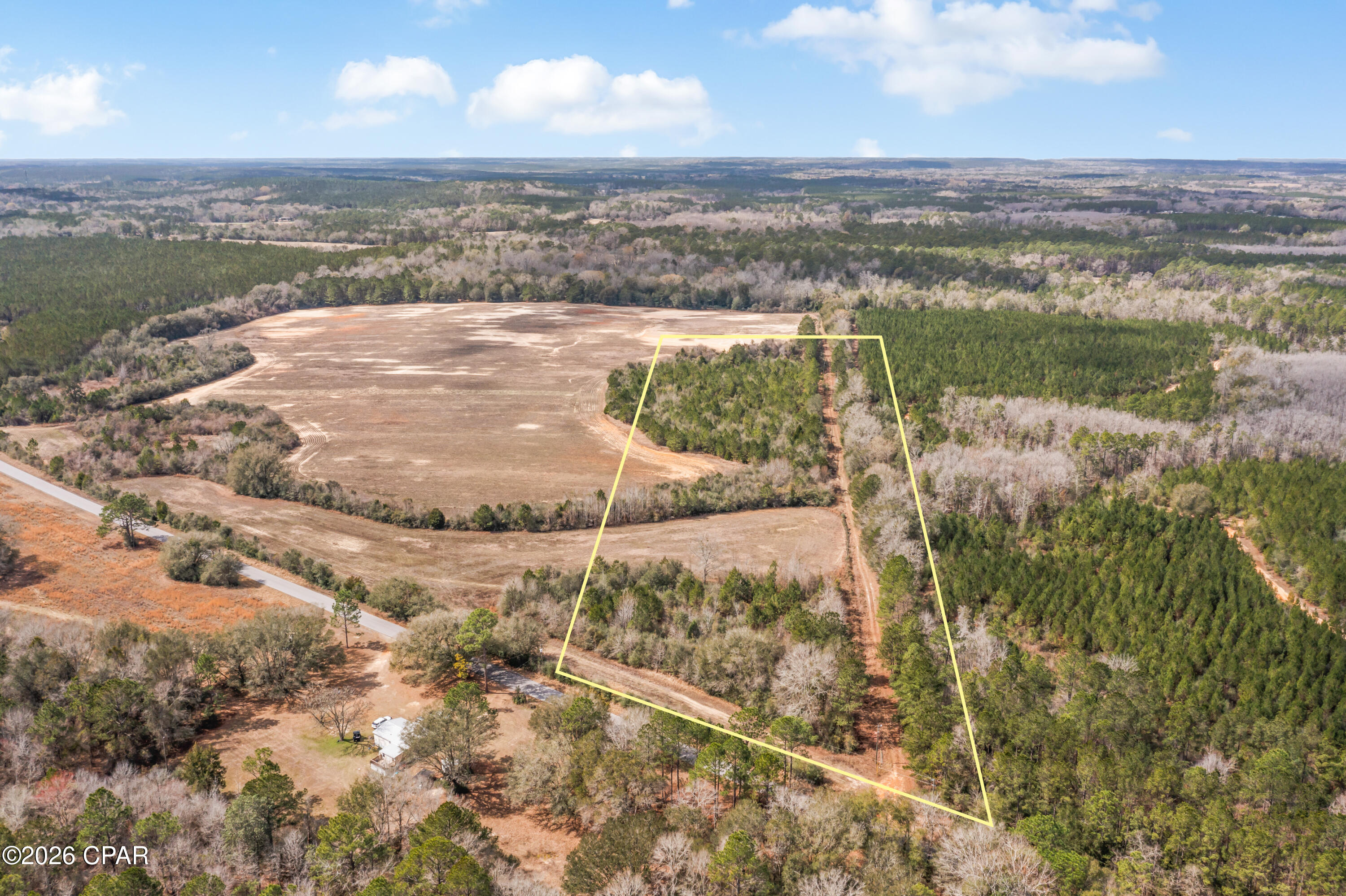 Welcome to this stunning 10+ acre parcel of land located in the beautiful countryside of the Florida Panhandle. This lot offers a great opportunity to build your dream home or invest in prime real estate. With highway frontage it is ideal for construction and easy accessibility. Don't miss your opportunity to own this gorgeous piece of property and turn your dreams into reality!