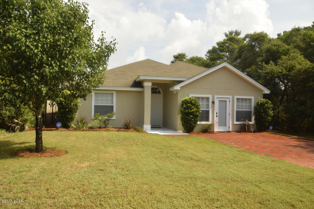 READY FOR SOMETHING BETTER! ITS TIME TO UPGRADE! THIS IS A GREAT HOME WITH LOTS OF ROOM FOR A BIG FAMILY AN OPEN FLOOR PLAN WITH VAULTED CEILINGS IN THE LIVING ROOM IT IS NEWLY REMODELED, INCLUDING NEW STAINLESS APPLIANCES, NEW PAINT INSIDE AND OUT, NEW LIGHTING, FLOORING. THE FLOORING IS MEXICAN SALTILLO TILE THROUGHOUT WITH HICKORY LAMINATE FLOORING IN ONE OF THE TWO MASTER SUITES,  THERE IS ALSO A LARGE LAUNDRY/UTILITY ROOM. THE EXTERIOR OF THE HOME FEATURES A LANDSCAPED PARADISE IN THE REAR YARD WITH A WATERFALL FEATURE THAT ENTICES YOU INTO THE  BEAUTIFUL POOL. THE IRRIGATION SYSTEMS KEEPS EVERYTHING GREEN AND FRESH. THIS HOME REQUIRES NO FLOOD INSURANCE! IT'S A SHORT RIDE BY GOLF CART TO THE INCREDIBLE WHITE SANDY BEACH!  YOU DESERVE THIS HOME! GET IT BEFORE ITS GONE!