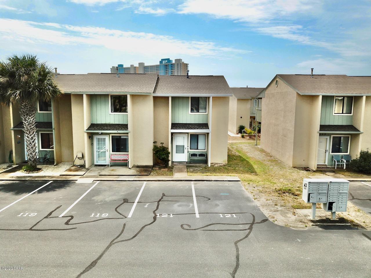 Very nice remodeled unit.  Tastefully decorated.  Move in Ready.  Features wood laminate flooring down stairs and up stairs.  Wooden steps in stairwell.  Also has a bonus room with bunk beds and T.V. upstairs.  Owner has installed an On Demand Hot Water Heater.  Also has a new roof, one year old.  Also features a WiFi thermostat to control your temperatures from your I-Phone. Has a Front Door and Back Door Ring system.  New Gutters on front and French drains on Front and  back side.  This unit is in a great location, just across the street from a pool, tennis courts and shuffleboard courts and plenty of over flow parking across the street.  A must see before you buy!
