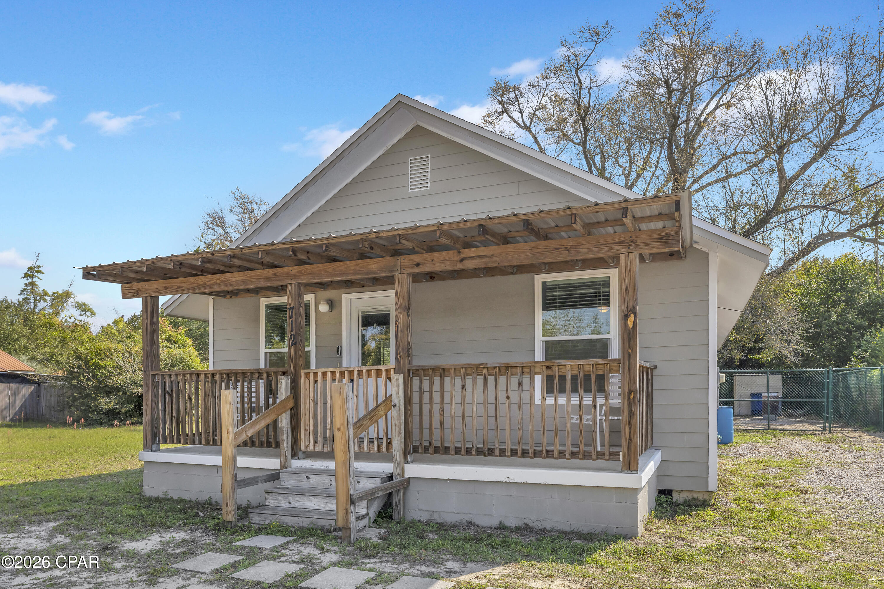 MOVE-IN READY | ESTABLISHED NEIGHBORHOOD | NO HOA
Panama City, Florida | Priced at $200,000, this detached single-family home offers a centrally located opportunity with a spacious, newly fenced backyard.
Renovated in 2020, the home features LVP flooring throughout and an open floor plan connecting the living area and kitchen, complete with stainless steel appliances.
The layout includes two bedrooms connected by a Jack-and-Jill bathroom, along with a second full bathroom located off the laundry area. A bonus room, currently configured as a sleeping area, provides flexible use for a home office, guest space, or additional living area.
The laundry room offers exterior access to the backyard, enhancing functionality for everyday use. Outside, the fenced yard provides usable space for outdoor living, storage, or pets.
A covered front porch with railings and a gate adds to the home's curb presence, while the surrounding established neighborhood features streets lined with mature trees--offering a setting distinct from newer construction areas.
Positioned in a convenient Panama City location, this property presents a practical option for buyers seeking value, flexibility, and usability without HOA restrictions.
All information is deemed reliable but not guaranteed; buyer to verify if important.