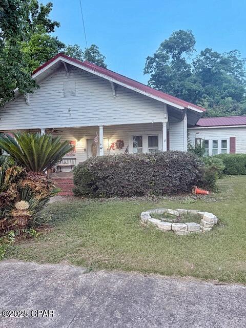 CURRENTLY UNDER CONTRACT, SELLER WILL CONSIDER BACKUP OFFERS
Spacious 4-Bedroom, 3-Bathroom Home in the Heart of Malone, FL

Welcome to this beautifully unique 4-bedroom, 3-bath home situated right in the heart of Malone! Thoughtfully designed with character and comfort in mind, this property blends timeless charm with modern convenience.

Step inside to find a spacious open-concept layout featuring a large kitchen with custom wood cabinetry and solid surface countertops, flowing seamlessly into the living and dining areas--perfect for everyday living and entertaining. Bamboo wood flooring adds warmth and elegance, while the original tongue-and-groove wood wall coverings give the home a distinctive, cozy feel. Most rooms boast soaring 12-foot ceilings, enhancing the home's open and airy atmosphere.

The versatile 4th bedroom, located just off the main living area with French doors, offers the perfect setup for a guest room, home office, or studio. A second living space showcases a stunning vaulted wood ceiling, a floor-to-ceiling brick fireplace, and direct access to an expansive concrete patio--ideal for outdoor gatherings. 

The master suite features its own ensuite bathroom and a private sitting area between the two spaces, offering potential for a walk-in closet, reading nook, or quiet retreat.

Outside, enjoy a fully privacy-fenced backyard, a wood-framed storage building, a deep covered front porch, and an attached carport. 

This charming and spacious home has all the room you need, inside and out. Don't miss your chance to own a piece of Malone living--schedule your private tour today!