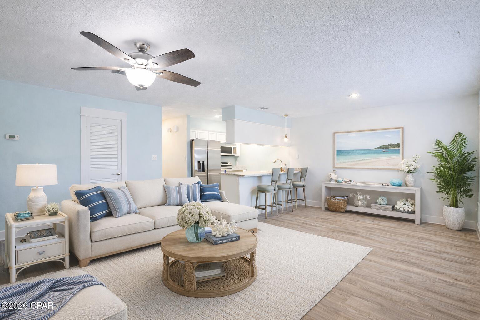 Beautifully updated 2BR | 2BA GROUND FLOOR condo with side lagoon views in Greenwood Estates - Unit 5B!

Enjoy easy coastal living with NO STAIRS and a serene side water view right from your front porch. This fully updated, move-in ready home features a bright coastal palette, all new luxury trim and finishes, granite countertops throughout, and new stainless steel appliances.

The open-concept layout offers great natural light, while both spacious bedrooms include their own full bathrooms--ideal for guests or rental flexibility. Washer and dryer included for added convenience.

What truly sets this unit apart is its rare combination of updates, location, and lifestyle at this price point--perfect for a primary residence, second home, or long-term investment.

Located in the quiet, lagoon-front community of Greenwood Estates, residents enjoy a relaxed setting with access to a community pool, boat dock, and beautifully maintained grounds. 

Boating enthusiasts will appreciate onsite gated boat & trailer storage ($50/month), along with several side boat dock access spaces for easy loading and unloading, plus multiple nearby public boat ramps for effortless days on the water.

Perfectly positioned in Upper Grand Lagoon, one of Panama City Beach's most desirable residential areas, you're just minutes from the beach, marinas, dining, shopping, and St. Andrews State Park.

Additional Highlights:

• LOW monthly HOA:  Includes everything except power & internet (NO special assessments).
• NEW roof & storm-grade windows (2021/2022).
• NEW stainless steel kitchen appliances.
• Fresh coastal interior paint throughout.
• New luxury trim & finishes.
• Granite countertops throughout.
• LVP flooring throughout (NO CARPET).
• Updated lighting, ceiling fans & fixtures
• Major systems updated & well maintained. 
• NO immediate replacement concerns. 
• Energy-efficient components for lower utility costs.
• The building's exterior stairs were just replaced and will be painted next (already included in the approved budget).

Truly turn-key, updated, and ready for immediate enjoyment.  Schedule your showing today!