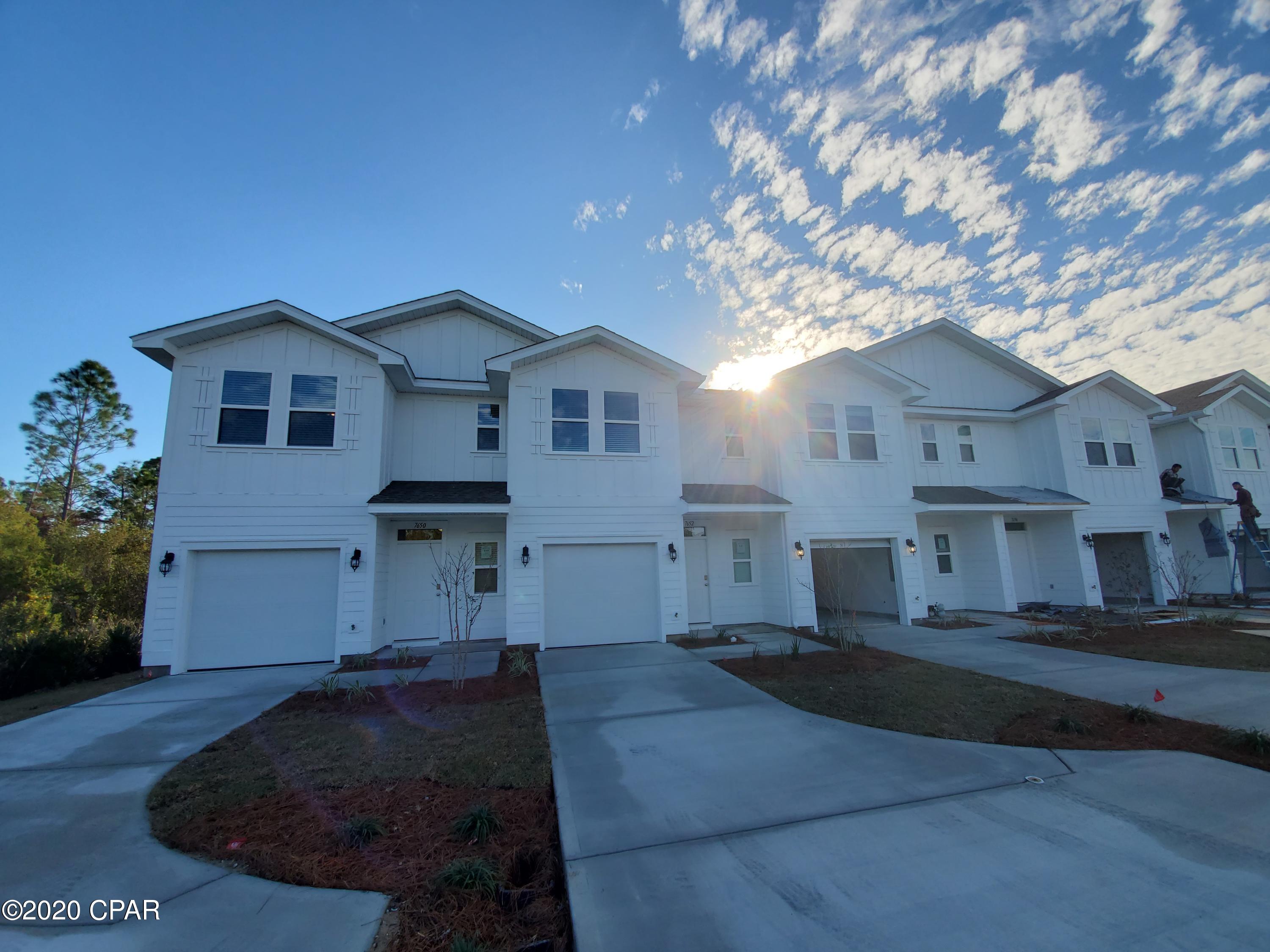 New construction 3 BR, 2.5 BA town home located at Hathaway Townhomes in Panama City Beach. The community boasts all new construction townhomes with a gorgeous resort style pool and sidewalks! The home offers an open floor plan downstairs with the kitchen overlooking the living and dining room. The kitchen features granite counters, custom cabinetry, stainless appliances, and a convenient half bath right off the kitchen. 10' ceilings throughout providing an airy spacious feel; Upstairs is a split bedroom plan; Master bedroom has plenty of room for King suite, walk-in closet & en suite bathroom. The master bathroom is spacious with a double vanity & stand up shower. Two additional bedrooms and bathroom with tub/shower combo. 1 car garage; Pets negotiable upon $250 pet fee;