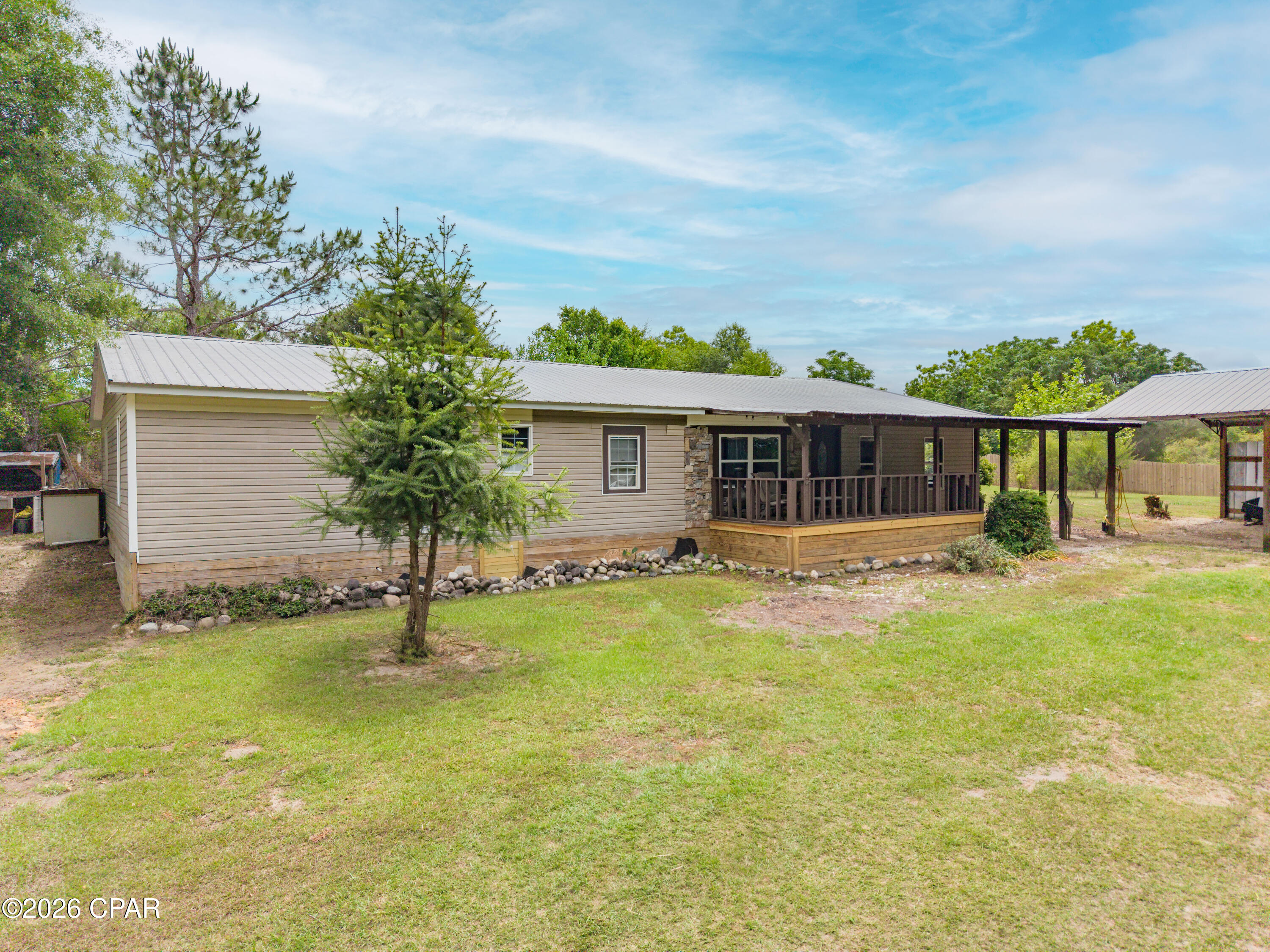 Located less than a mile from Bonifay, this property offers the perfect mix of convenience and quiet country charm. Enjoy a peaceful pond, two pole barns (including an RV setup with water & electric), plus a chicken pen and dog run already in place.
Fruit trees, open space, and endless possibilities make this ideal for a mini-farm, homestead, or private retreat. With little light pollution, you'll love the starry nights and the sound of frogs as your evening soundtrack.