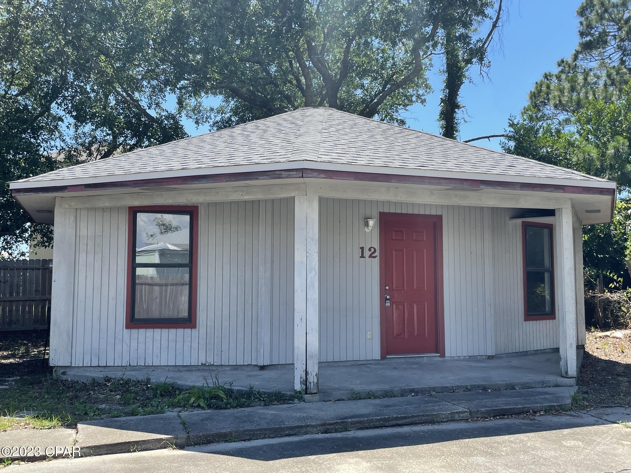 1 Bedroom/1bath detached beach cottage located at the very end of a cul de sac. Private, but just blocks from Thomas Dr. from Central heat and air. Water and yard care included. No w/d hook up.