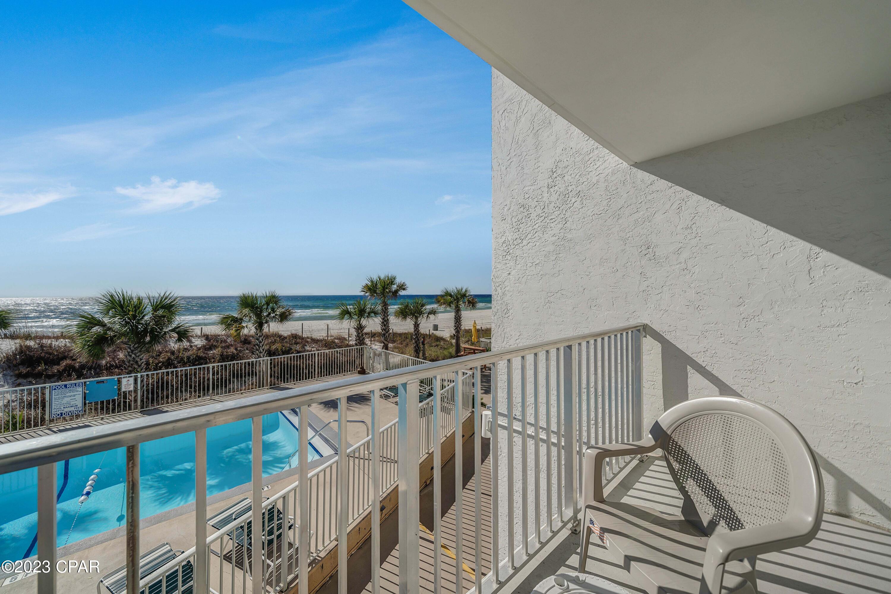 Calling all Beach Lovers! No need to climb steps at this one- This street level unit #108 at Ambassador should definitely be in your future, especially since several newer attractions and restaurants have opened for business close by.  The HOA fees here include insurance on the building, pest control, trash, water, sewer, cable and internet. The maintenance on the common areas including the pool are also part of the HOA fee. If receiving rental income is not your thing, use your condo for your own enjoyment and entertainment. Pretty views of the gorgeous beach and emerald water are the real bonus here! 
Also noteworthy is the very first TOPGOLF on the Florida Gulf Coast (a premiere state-of-the-art sports facility) is open and is in walking distance. The popular attraction is a two-story building with more than 70 tee pads or bays, a full restaurant and bar, a mini golf area, and an outdoor patio. Pier Park is also practically next door with so many shopping and dining experiences available for the taking. You only go around once, so come and live the dream in PCB!