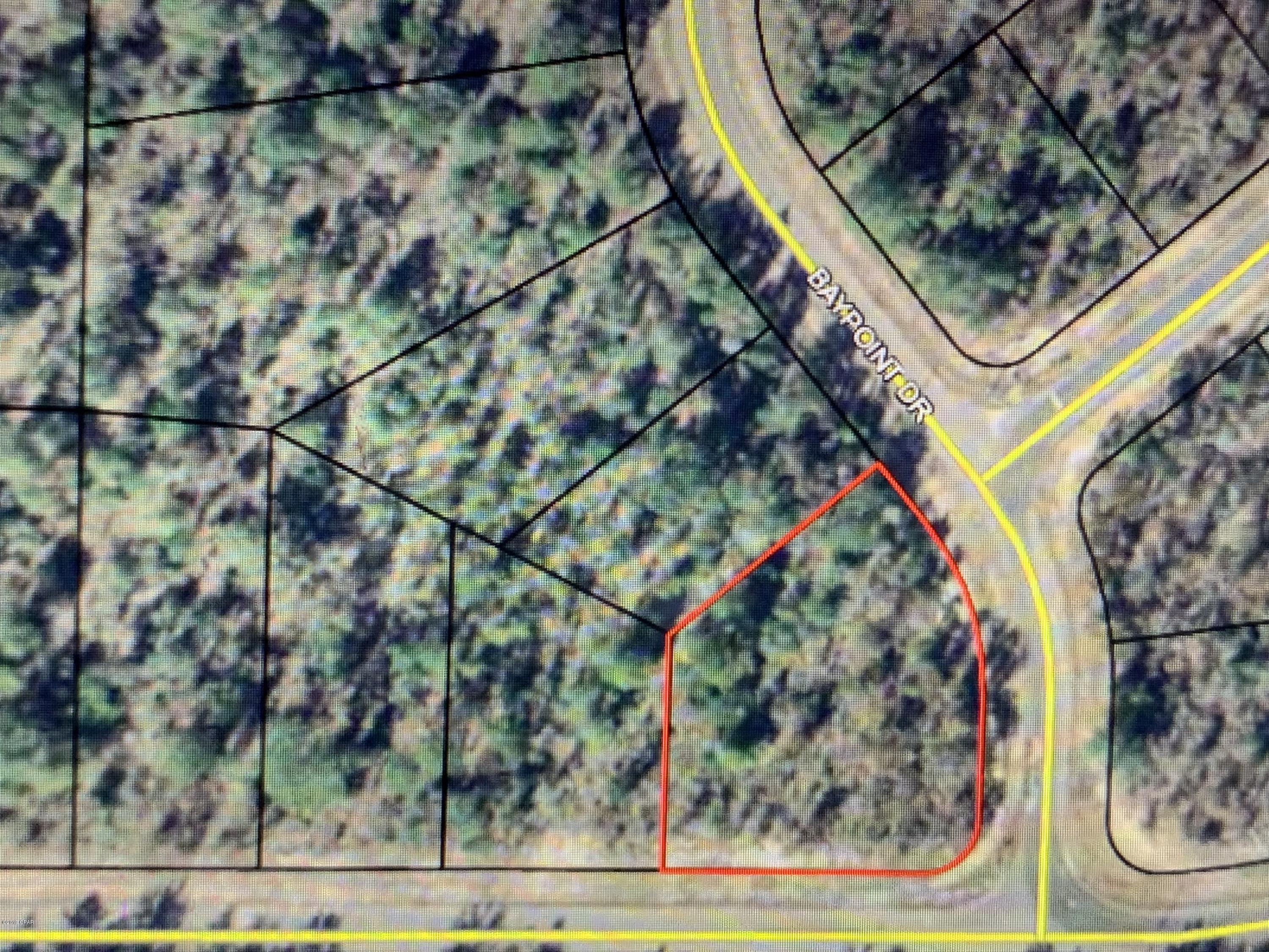 This is a half acre lot for under three thousand dollars!  It is lot # 7 in Unit 10 of Sunny Hills.  This is a Quiet and Peaceful area and yet it is close enough to the beach and to the airport.  Enjoy the country feel of this neighborhood.  Better yet, enjoy the corner lot where Airmont meets Baypoint Drive.  Sunny Hills has long been known for golfing, fishing, kayaking, and privacy.  No mobile homes are allowed so build that dream home on a VERY reasonable  

 ''steal of a deal'' piece of land!