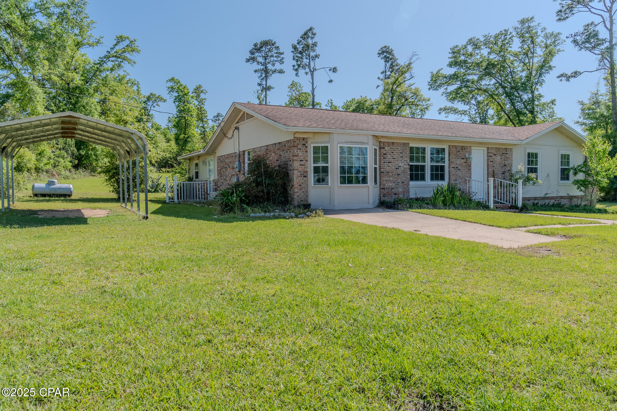 This home has been greatly reduced. It is being sold AS-IS and will require a cash buyer. The seller WILL NOT MAKE ANY REPAIRS. Unlock the potential of this charming 3 bedroom, 2 bath brick home nestled on a sprawling 1.25 acre lot in a peaceful neighborhood on a paved road. The home is a blank canvas to customize, design, and create the home you've always wanted. This property includes significant recent upgrades including, new windows, new HVAC system, and new durable Hardie board siding. The dishwasher does not work. While the interior awaits your personal touch and TLC, picture your long-awaited dream home. Strategic opportunity to invest in a solid structure with endless possibilities! Make an appointment to see it today. Seller is VERY MOTIVATED, bring ALL OFFERS.  Some of the photos are virtually staged.