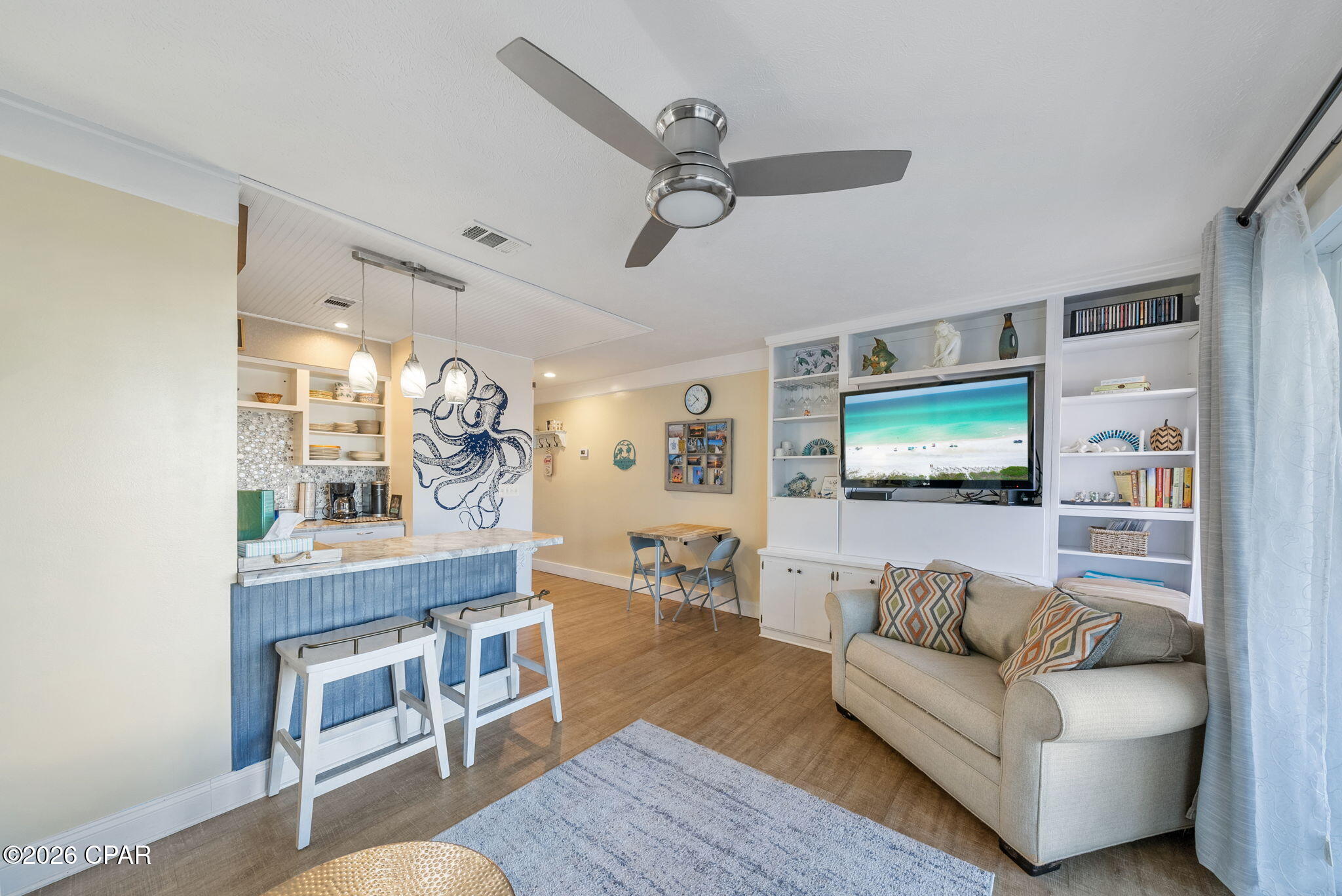 Welcome to Unit B2, an income producing, fully updated condo at Endless Summer. This tastefully updated and well maintained ground floor unit is located in the highly sought after front buildings for quick and easy beach access, just steps from the sugar white sands of the quiet west end of Panama City Beach.

This condo is sold fully furnished and offers excellent rental performance, producing $23,063 in 2025 with nearly $10,000 already on the books for 2026. Additional upgrades include a new patio storage shed, along with HVAC and water heater installed in 2020.

Inside, you'll find vinyl plank flooring throughout and a bright, coastal feel with new interior paint, a new sleeper sofa, new microwave, two new windows, new rugs, curtains, and updated kitchen items, making this unit truly move in or rental ready. The adorable kitchen features stainless appliances, a breakfast bar with seating, and charming beach accent details. The spacious bedroom offers plenty of storage, and the updated bathroom includes a tiled walk in shower. Step outside to your private patio overlooking the pool, perfect for relaxing after a day at the beach.

Endless Summer is a laid back community with low HOA dues and a healthy reserve fund, featuring two large pools, a hot tub, shuffleboard, horseshoes, bean bag toss, and a clubhouse, all set around a beautifully landscaped courtyard. Beach Access 70 and 71 are just steps away, and you're only five minutes from Pier Park and about ten minutes from the charm of 30A.

Whether you're looking for a personal beach getaway or a strong investment opportunity, this condo checks all the boxes. Don't miss your chance to enjoy the Endless Summer lifestyle!

All information is believed to be accurate but should be verified if important.