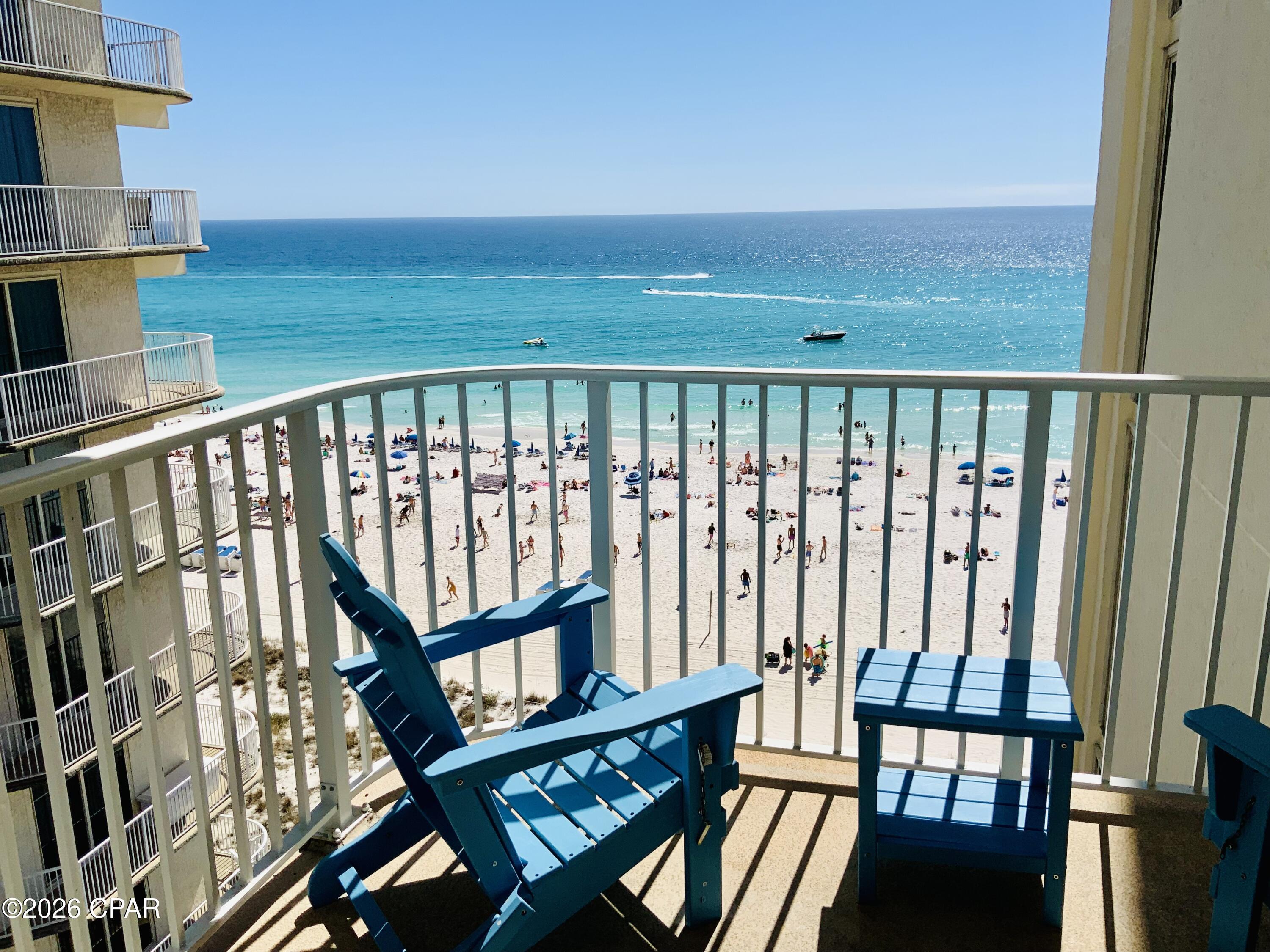 This cozy, Gulf-front efficiency at Long Beach Resort is the perfect blank canvas for your coastal vision. Perfectly sized for a romantic honeymoon suite, a private couple's retreat, a beachy hideaway for the kids, and/or an Income-producing investment, this unit is ready for a modern refresh to make it truly yours. 
The space features its original layout--including the washer/dryer and appliances--and is priced to let you invest in the custom finishes you've envisioned.  Located on a sprawling stretch of Sugar Shore and emerald waters, you'll enjoy a more intimate atmosphere than the higher-rise crowds as this complex is only 14 stories high.  With convenient parking, local shops, and popular entertainment spots within walking distance, everything you need is within minutes. On-site amenities include heated pools, a bar and grill, and fitness center. This gated complex is getting ready for a great new season with restoration, landscape, and amenity projects to be completed soon for you and your guests to enjoy.