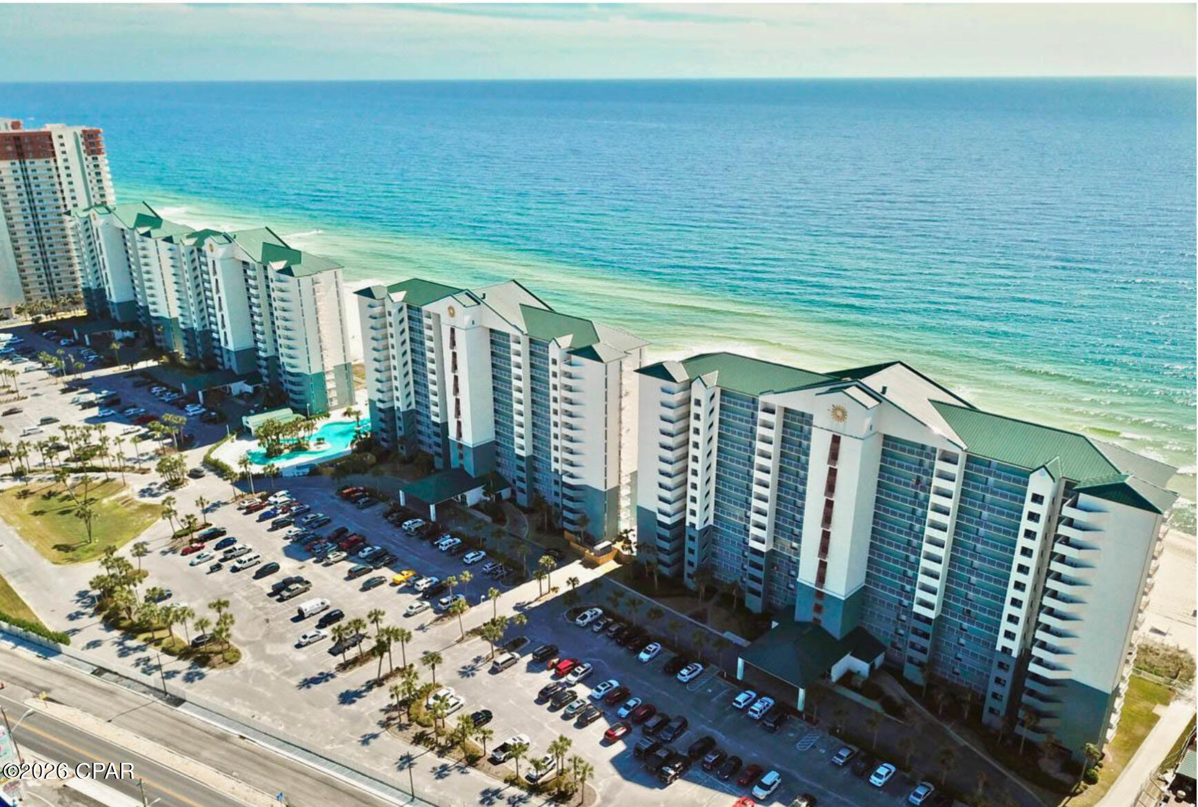 This cozy, Gulf-front efficiency at Long Beach Resort is the perfect blank canvas for your coastal vision. Perfectly sized for a romantic honeymoon suite, a private couple's retreat, a beachy hideaway for the kids, and/or an Income-producing investment, this unit is ready for a modern refresh to make it truly yours. 
The space features its original layout--including the washer/dryer and appliances--and is priced to let you invest in the custom finishes you've envisioned.  Located on a sprawling stretch of Sugar Shore and emerald waters, you'll enjoy a more intimate atmosphere than the higher-rise crowds as this complex is only 14 stories high.  With convenient parking, local shops, and popular entertainment spots within walking distance, everything you need is within minutes. On-site amenities include heated pools, a bar and grill, and fitness center. This gated complex is getting ready for a great new season with restoration, landscape, and amenity projects to be completed soon for you and your guests to enjoy.