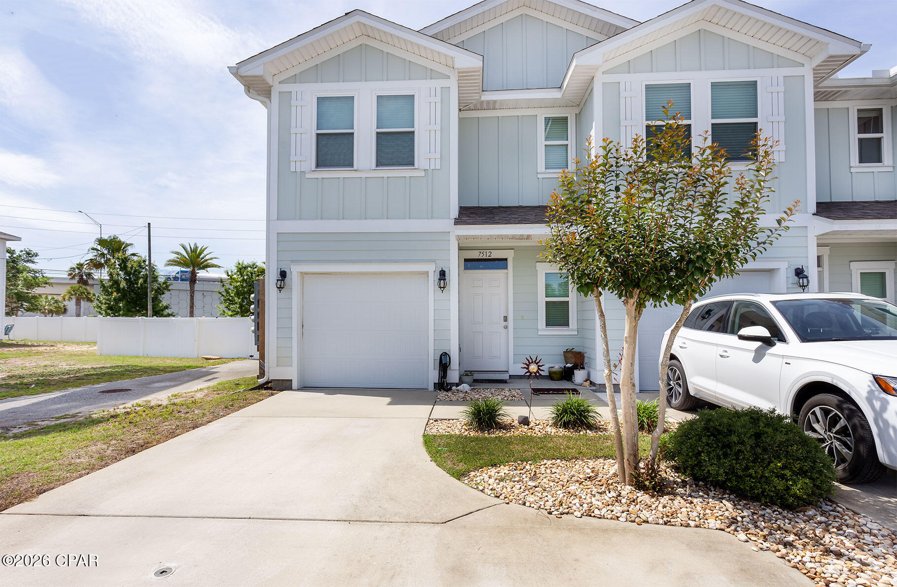 Here is the perfect townhome in PCB. This 3 bedroom 2.5 bath boasting a new A/C unit and impact doors and windows. These upgrades allow you more energy efficiency while you are cool and comfortable. The impact windows and doors also reduce noise and gives you peace of mind. As you enter you will find an open main living area with a half bath and garage. There is a lot of natural light in this end unit. As you enter the fence backyard, you will find a private oasis with a deck and entertaining area. Up stairs you will find the owners suite and private bath along with two additional bedrooms, an additional bathroom, and laundry area. The location is perfect only a short drive to the beach, restaurants, shopping, grocery stores, the navy base and more. The home has granite countertops, stainless steel appliances and a washer and dryer. Hathaway townhomes allows STR, HOA fees includes a resort style pool, lawn care, and trash pickup, making it low maintenance as well.