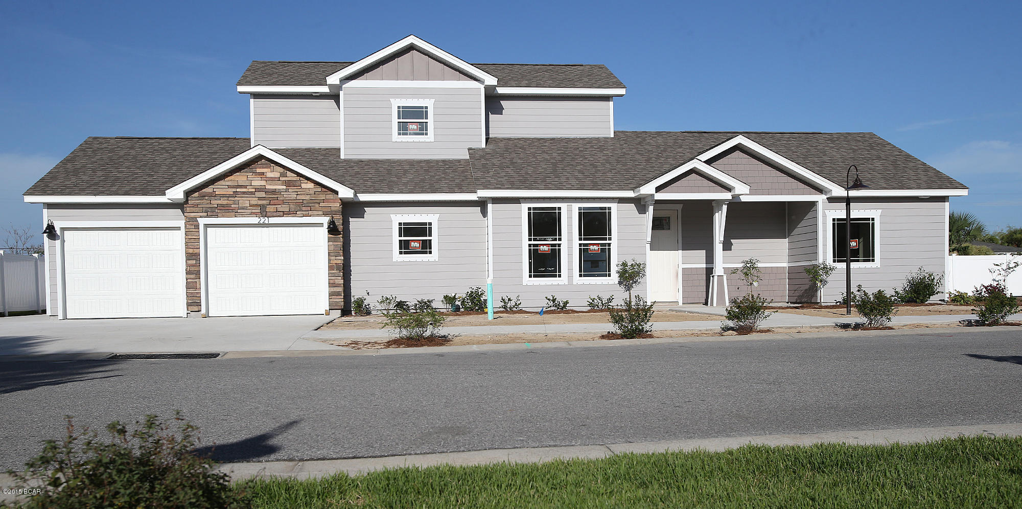The ''Sunrise'' model features an open floor plan on the first floor with great connectivity from the kitchen to the main room and is built on one of the premium lots. You are going to love Panama City Beach's NEWEST neighborhood, Ocean Mist located just 1/2 mile from the beach and less than 2 miles to Pier Park in the popular Bid-A-Wee Beach area. Featuring BRAND NEW craftsman-style homes, Ocean Mist is a PRIVATE, GATED COMMUNITY with only 24 homes total protected from the hustle and bustle of the tourists. Enjoy a nice stroll along well-lit sidewalks to the truly fantastic pool amenity and take comfort in knowing that traffic will be limited not only because of the gate, but also because there will be no short term rentals allowed. You are just a short stroll or golf cart ride to the beach or a quick bike ride or car ride to Pier Park. Cut your ownership costs dramatically by owning a BRAND NEW, energy efficient home with a warranty. This is the opportunity you have been waiting for.