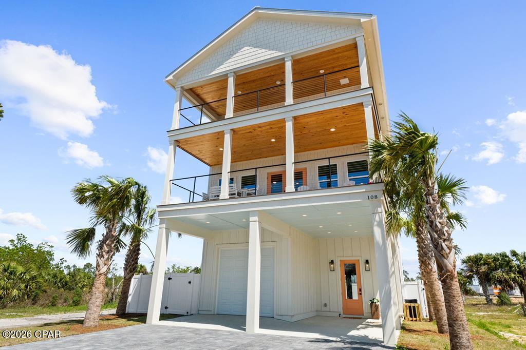 Welcome to 108 N 32nd St, a brand-new 4BR/3BA home perfectly situated in the heart of Mexico Beach--just 1,000 feet from the nearest beach access and steps from local favorites like Mango Marley's, the future grocery store, coffee shops, and Ace Hardware. Built with both comfort and style in mind, this home offers 1,872 square feet of living space and Gulf views from both balconies. The interior features LVP flooring throughout with a kitchen that includes soft-close cabinets with quartz countertops, stainless steel appliances, and a tile backsplash. The open-concept living area is warm and inviting, featuring shiplap walls and wood accents that bring a beachy feel. Off the living room, enjoy a 14-foot-wide covered balcony with Trex decking, the perfect spot for morning coffee or sunset views over the Gulf. Every bathroom in the home features a fully tiled shower, and the primary suite is absolutely amazing --offering a private covered balcony, dual vanities with a tile backsplash, and a large walk-in shower. Outside, the home is designed for low-maintenance enjoyment with a heated gunite pool surrounded by pavers, a fenced yard, and an outdoor shower for rinsing off after the beach. Additional features include ample parking, covered golf cart parking, and plenty of outdoor storage. Whether you're looking for a full-time residence, a vacation getaway, or an investment property, this newly built property checks every box for the ideal Mexico Beach lifestyle-- quality construction and a prime location close to everything that makes this beach town special.
