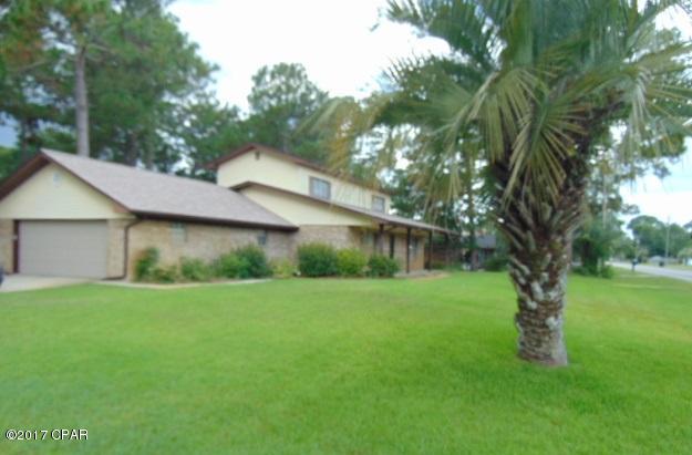 2 Story 4 bedroom 2 bath home with 2 car garage, large front porch, porch off the back bedroom on chain link fenced large corner lot with storage shed.  This home features a formal living area, formal dining, breakfast room, den, large tile floor sun room, 2 bedrooms downstairs, master bedroom and additional bedroom upstairs with a shared bathroom.

This home is on well and septic tank.

Lawn service and Culligan Water Filtration system provided by owner.

Fireplace is NON WORKING!