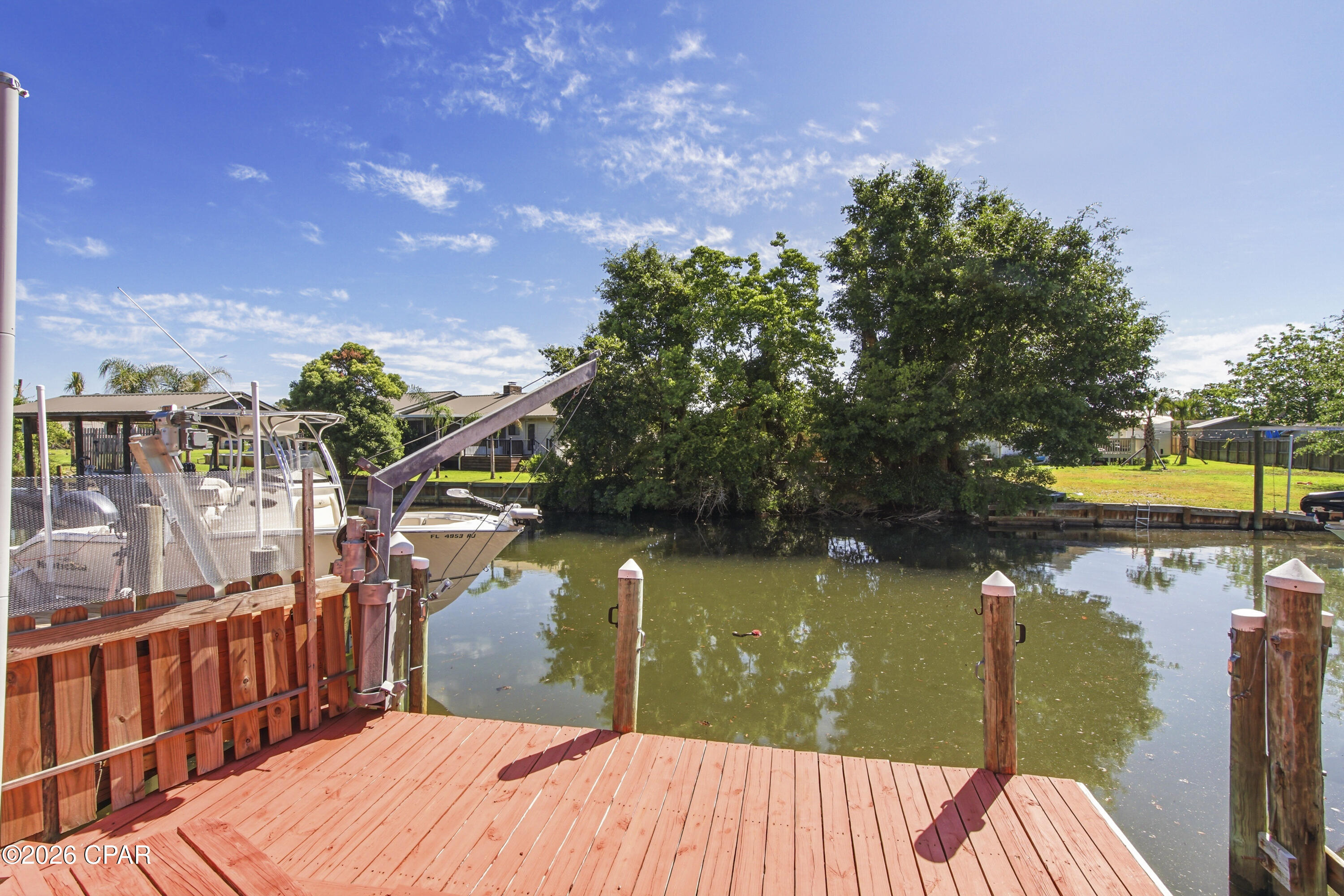 🌊 Canal-Front Townhome with Direct Bay Access - Boater's Dream! 🚤 AND NO HOA!!

Wake up to waterfront living in this beautifully situated 3-bedroom, 2.5-bath canal-front townhome offering the ultimate coastal lifestyle. With direct access to North Bay, you can step right out your back door and be on the water in minutes--perfect for boating, fishing, or a quick trip over to Shell Island.

Inside, you'll find a warm and inviting layout featuring a cozy fireplace, ideal for relaxing evenings, and two private balconies where you can enjoy peaceful water views and coastal breezes.

Step outside to your expansive multi-level deck and dock, designed for entertaining, soaking up the sun, or tying up your boat after a day on the water.



Highlights include:

3 Bedrooms | 2.5 Bathrooms
Canal-front with easy bay access
Fireplace for added charm
Double balconies with scenic views
Large multi-level deck & private dock
Newly paved road

Prime Location:
Conveniently located near Tyndall Air Force Base, the Naval Surface Warfare Center, local hospitals, shopping, and dining. Plus, you're just a short drive to Pier Park and the world-famous beaches.

Whether you're looking for a full-time residence, vacation getaway, or investment opportunity, this waterfront gem checks all the boxes.

Don't miss your chance to own this slice of paradise--schedule your showing today!