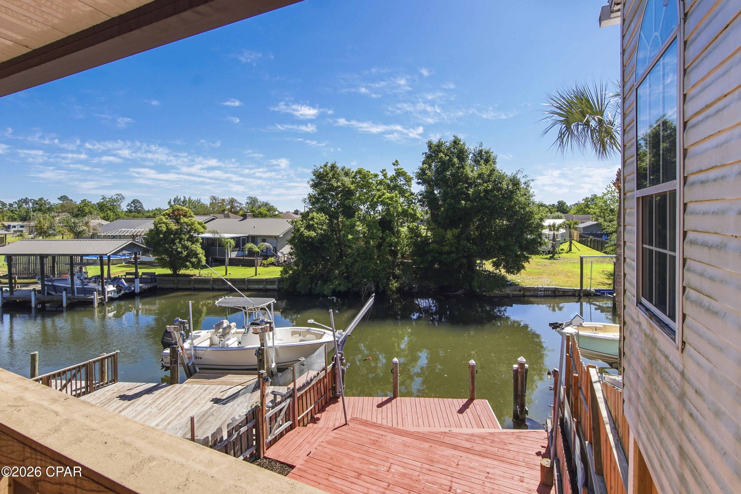 🌊 Canal-Front Townhome with Direct Bay Access - Boater's Dream! 🚤 AND NO HOA!!

Wake up to waterfront living in this beautifully situated 3-bedroom, 2.5-bath canal-front townhome offering the ultimate coastal lifestyle. With direct access to North Bay, you can step right out your back door and be on the water in minutes--perfect for boating, fishing, or a quick trip over to Shell Island.

Inside, you'll find a warm and inviting layout featuring a cozy fireplace, ideal for relaxing evenings, and two private balconies where you can enjoy peaceful water views and coastal breezes.

Step outside to your expansive multi-level deck and dock, designed for entertaining, soaking up the sun, or tying up your boat after a day on the water.



Highlights include:

3 Bedrooms | 2.5 Bathrooms
Canal-front with easy bay access
Fireplace for added charm
Double balconies with scenic views
Large multi-level deck & private dock
Newly paved road

Prime Location:
Conveniently located near Tyndall Air Force Base, the Naval Surface Warfare Center, local hospitals, shopping, and dining. Plus, you're just a short drive to Pier Park and the world-famous beaches.

Whether you're looking for a full-time residence, vacation getaway, or investment opportunity, this waterfront gem checks all the boxes.

Don't miss your chance to own this slice of paradise--schedule your showing today!