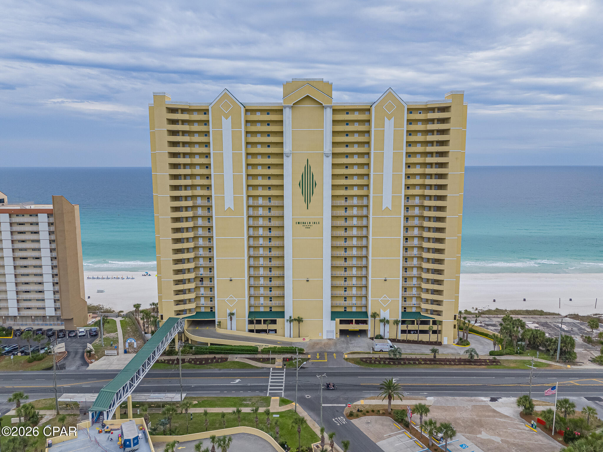 'CURRENTLY UNDER CONTRACT, SELLER WILL CONSIDER BACKUP OFFERS' DEEDED PARKING SPACE INCLUDED. This spacious, bright Gulf-front condo at Emerald Isle offers the ideal mix of personal beach retreat and income-producing investment, previously averaging approximately $58,000 in annual gross rental revenue, making it perfect to enjoy part-time while helping cover costs and generate cash flow. The open layout features 9' ceilings, crown molding, luxury vinyl plank flooring, and abundant natural light, with seamless flow between the living, dining, and kitchen areas centered around Gulf views, while the kitchen includes granite countertops and a breakfast bar. A standout feature is the oversized 10.5' x 28' curved Gulf-front balcony with panoramic coastline views, accessible from both the living area and the Gulf-front primary suite, and each bedroom offers private bathroom access for added comfort. Recent updates include a new HVAC (Nov 2024) and 2020 water heater, along with a stacked washer/dryer, exterior storage closet, and deeded parking space located just steps away from the elevators. Residents enjoy resort-style amenities including Gulf-front pools, hot tubs, steam room, fitness center, and covered parking, with HOA fees covering everything except electricity and pet-friendly ownership. Located on the west end of Panama City Beach just minutes from Pier Park, dining, and entertainment, this condo offers both convenience and a laid-back coastal lifestyle.