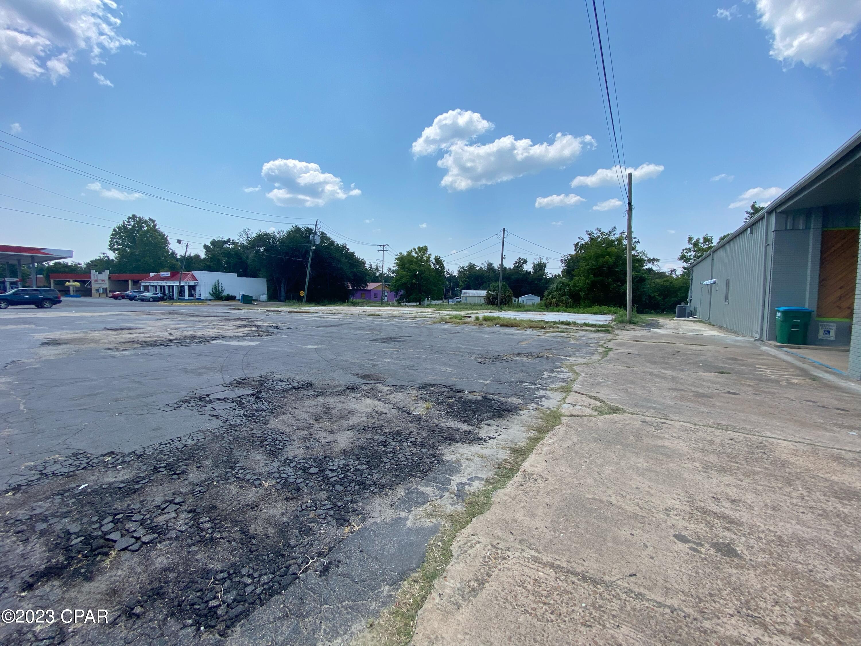 Great commercial lot on busy Hwy 90 ; DOT traffic count past this property averages 17,000 daily. The previous building has now been demolished and this is a vacant corner lot prime for new development. The lot is mostly paved, and near many other successful businesses such as fast food restaurants & car dealerships.