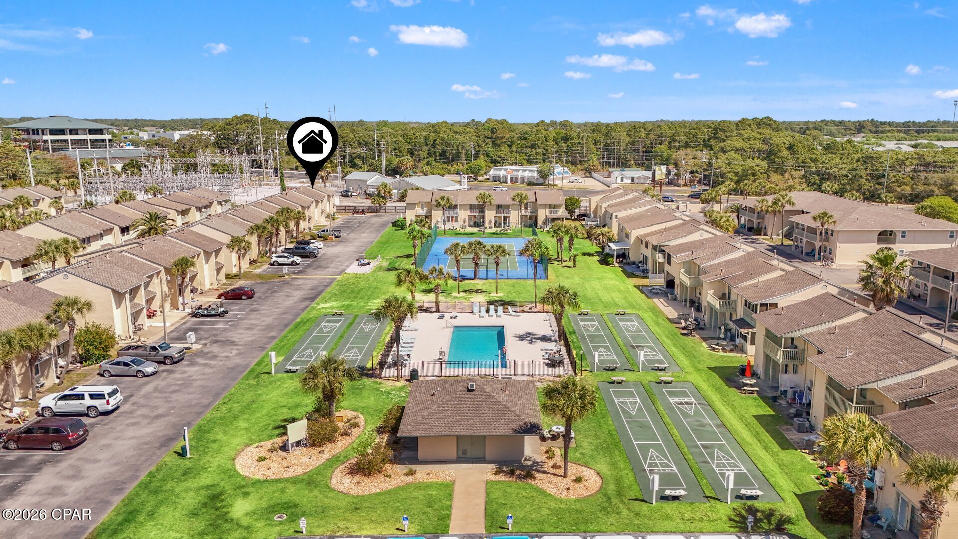 Beach Life, Rental Income  Incredible Value, All in One! This is the beach townhome you've been waiting for! Fully furnished and rental-ready, all you need to bring is your suitcase and toothbrush. Located just a 6-minute walk to the beach or 2 min golf cart ride, this beautifully maintained unit offers unbeatable value and comfort. Enjoy your evenings on the extended tropical back patio or relax on the balcony, surrounded by 11 sparkling community pools and Florida nature. With 2 assigned parking spaces right at your door and additional golf cart parking, convenience meets coastal charm. Additional highlights: VA & FHA friendly, STR-friendly with strong projected GRI of $25k+($35k+ with some updates). Exceptionally cared for, this is a rare opportunity to own a move-in-ready beach retreat in one of Panama City Beach's most sought-after communities. You won't find a better deal at the beach! Call your agent TODAY! LOW HOA fees include: 11 pools(5 heated), pickleball, shuffleboards, water-front restaurant  pool, mini golf, exercise room, tennis courts, playground, WIFI, pest control, termite bond, trash, ground keeping, property patrol, gated community and more.