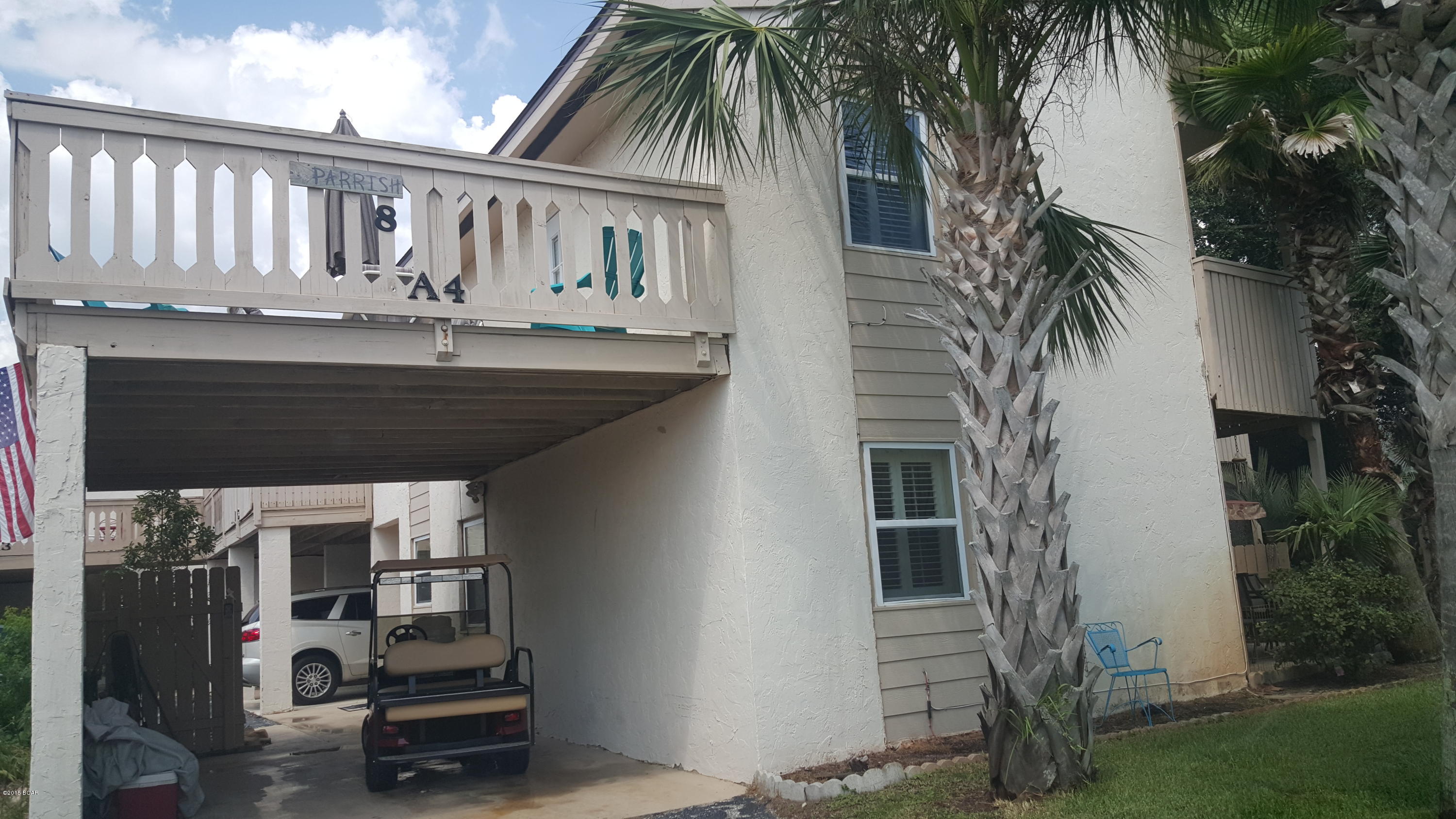 Beautiful 2 story condo. Horizon South is a family vacation spot & golf cart community with 2 pools,tennis,putt putt & community rm. Condo has laminate floors, new appliances,tile backsplash, new fixtures, new carpet upstairs in bedrooms, newly painted. Master bedroom has it's own bath with door going out to large upper deck. Great for afternoon sunsets. French doors lead from LR to a beautiful, lush backyard, with a covered porch. Sit & swing awhile or take a nature walk. If you have children or the 4 legged kind, it's a great play place. Sold furnished, except for dishes, dolls & doggie fence in backyard.