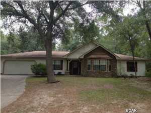 -FIND TRANQUILITY UNDER THE OAKS AT PARADISE LAKES! VERY APPEALING STONE ENTRANCE LEADS INTO A MODERN HOME WITH AN OPEN FLOOR PLAN, LARGE FAMILY ROOM W/ VAULTED CEILING, WOOD LAMINATE & TILE FLOORING THROUGHOUT, CARPET IS ONLY IN THE TWO ADDITIONAL BEDROOMS. KITCHEN W/ TILE BACKSPLASH IS OPEN TO THE DINING AREA W/ FRENCH DOORS THAT LEAD OUTSIDE TO THE LARGE FENCED BACKYARD. HIS & HER WALK-IN CLOSETS IN THE MASTER BEDROOM, DOUBLE VANITY IN MASTER BATH. LARGE LAUNDRY ROOM, 2 CAR GARAGE WITH PULL DOWN STAIRS. ENJOY FISHING & BOATING IN SPRING-FED LAKE DUNFORD.