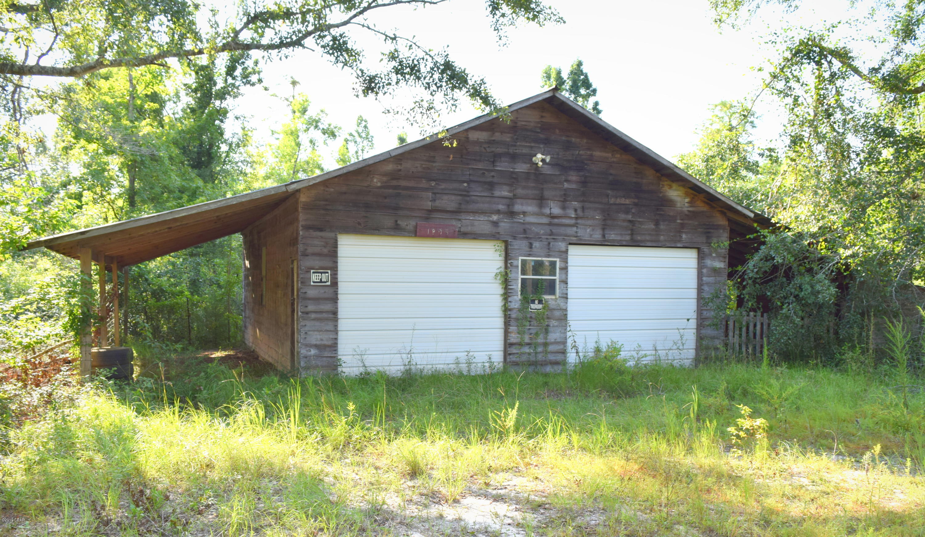 This 10.22 acre wooded tract is ready for your dream house or mobile home. Featuring a 52x32 enclosed cypress barn, well, septic and electricity this prime property offers seclusion yet is minutes from Hwy 77 and a short drive to Interstate 10.