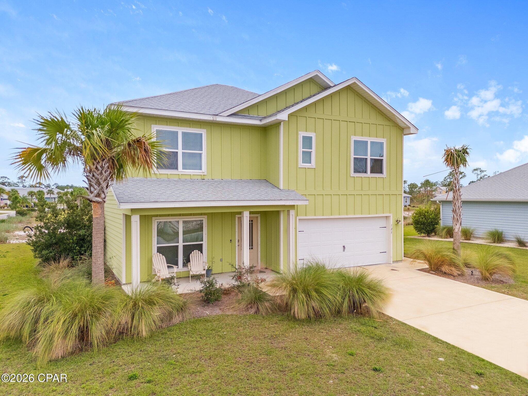 Welcome to Windmark's Lady, a beautifully appointed, furnished coastal retreat in the highly sought after WindMark Beach community of Port St. Joe. This spacious corner lot 5 bedroom, 3 bath home comfortably sleeps up to 16 guests and is an established short-term rental with current and upcoming bookings already in place, making it an exceptional investment opportunity or second home with immediate income potential. Designed for entertaining and relaxed beach living, the home features an open concept living area, a fully equipped kitchen, generous bedrooms, and a large playroom/game space perfect for families and groups. Outdoor living areas provide the perfect spot to unwind after a day on the sugar white sands, and the included golf cart makes trips to the beach and around the community effortless and fun. This prime lot is located just a short walk to beach access, residents and guests enjoy access to two resort-style pools, 3 miles of scenic walking and biking trails with multiple board walks to the water, showers, playgrounds, dog parks, and the vibrant Town Center with dining and shopping. Sold fully furnished and rental ready, this is a rare opportunity to own a proven income producing property in one of the Gulf Coast's most desirable beach communities!