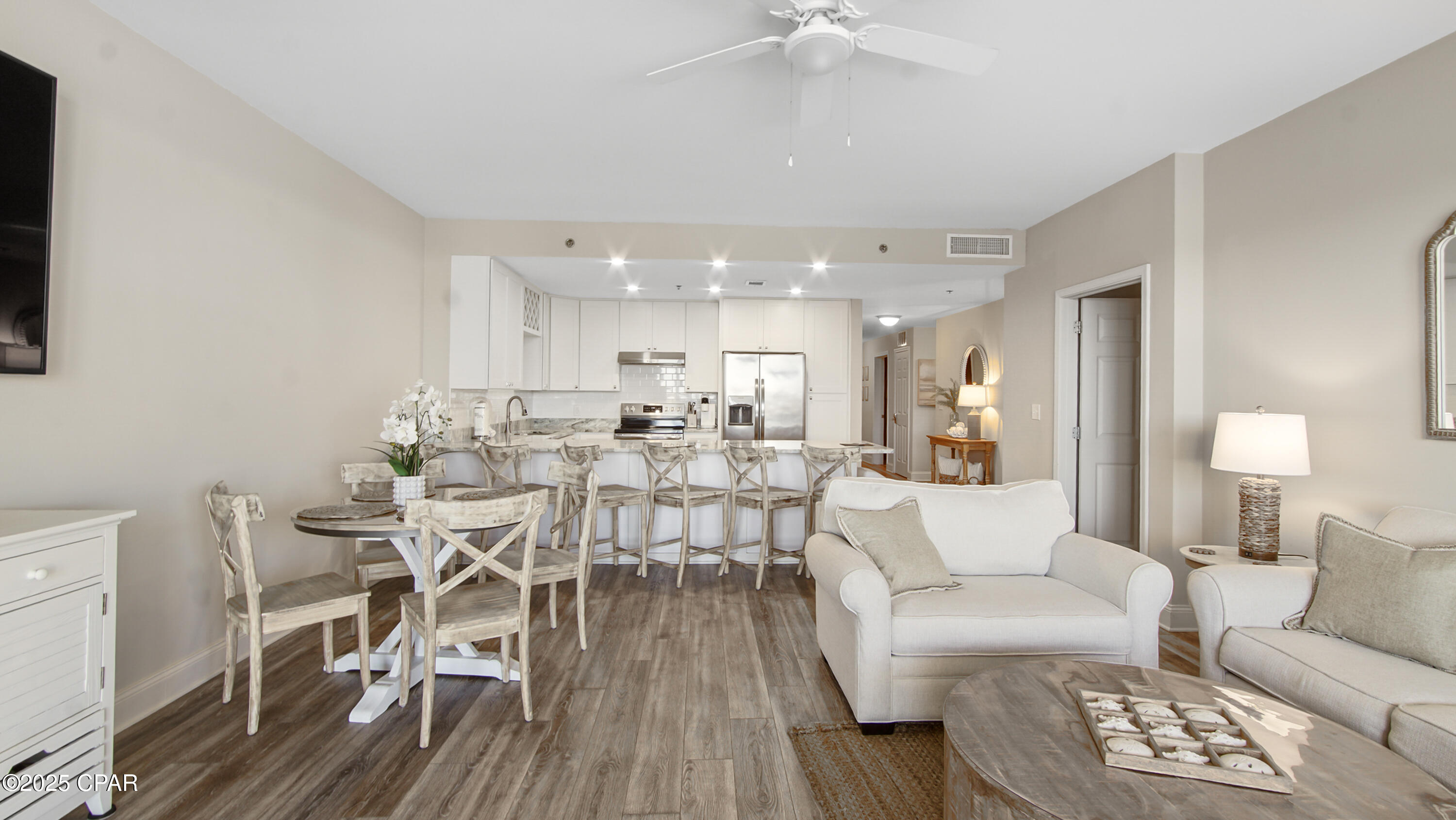 FULLY FURNISHED & A CURRENT CASH FLOWING INVESTMENT!!

Welcome to Laketown Wharf #234, a stunning, fully renovated 3-bedroom, 3-bath residence offering breathtaking views from the main living area, primary suite, and oversized balcony. The unit is located on the second floor, offering convenient access to the parking garage—if you park on Level 2, you can walk directly to the unit without needing the elevator! Plus, you're just steps from the beach!

Laketown Wharf is one of the most sought-after buildings in PCB. This turn-key condo combines coastal living and convenience. The unit has a strong track record of rental income. And a full-year expected to be $56,000, it presents an outstanding investment opportunity—or if rentals aren't the goal, this beautiful unit can also make the perfect second-home getaway.

The resort features some of the largest floor plans in PCB with 9-foot ceilings, and an impressive list of amenities including: five pools, two hot tubs, a putting green, and a fitness center with Gulf views. As the sun sets, enjoy the nightly 8 p.m. light show that adds a touch of magic to your beachfront evenings. The complex also offers on-site dining, billiards & bowling alley, and much more! Your family or rental guests will love vacationing here and want to come back every year!

Step inside to discover an open-concept layout designed for entertaining, featuring coastal-inspired finishes, updated flooring, lighting, and premium furnishings. The updated kitchen is equipped with stainless steel appliances, granite counters, and plenty of storage. The spacious primary suite offers balcony access and a spa-like en suite with a soaking tub and a walk-in shower with multiple jets. Every detail has been carefully curated, from the decor to the thoughtful updates.

The condo also includes a NEW AC unit, washer/dryer, and parking just steps away with minimal elevator traffic. Experience the perfect blend of luxury, location, and income potential—this one truly has it all.
