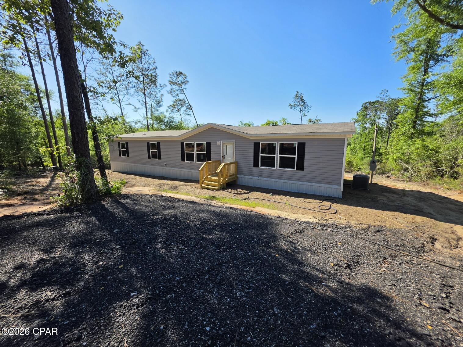 Brand-new for 2026, this manufactured double-wide sits in the heart of Alford Florida just 30 minutes from Panama City. Spanning 1,791 square feet, the home offers a bright, open-concept layout with 4 bedrooms and 2 bathrooms. Thoughtful construction and energy-conscious features deliver comfort and efficiency, making it a fantastic primary residence or vacation retreat. Upgrades include 2x6 exterior walls for enhanced durability, upgraded insulation for year-round comfort, and energy Star appliances. 
Multiple lot and home packages available. Contact your agent for more information. All measurements are to be verified by buyer.