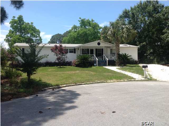 Additional Florida Room that measures approx 33X23 wonderful for family events. Wonderful Vaulted Ceilings Split Floor Plan Mobile Home. Open and Spacious with Kitchen that hosts center island, lots of cabinetry and counter space for the expert cook, Family Room with Wood Burning Fireplace, Separate Dining Room great for entertaining. 2 Car Carport in Back to park cars with plenty of space for additional parking if needed. Newer Shed great for additional storage or work shop whichever you prefer. Sprinkler system and the landscaping which shows well. Newer Roof and AC. All Measurements are approx please verify......Come and See.....