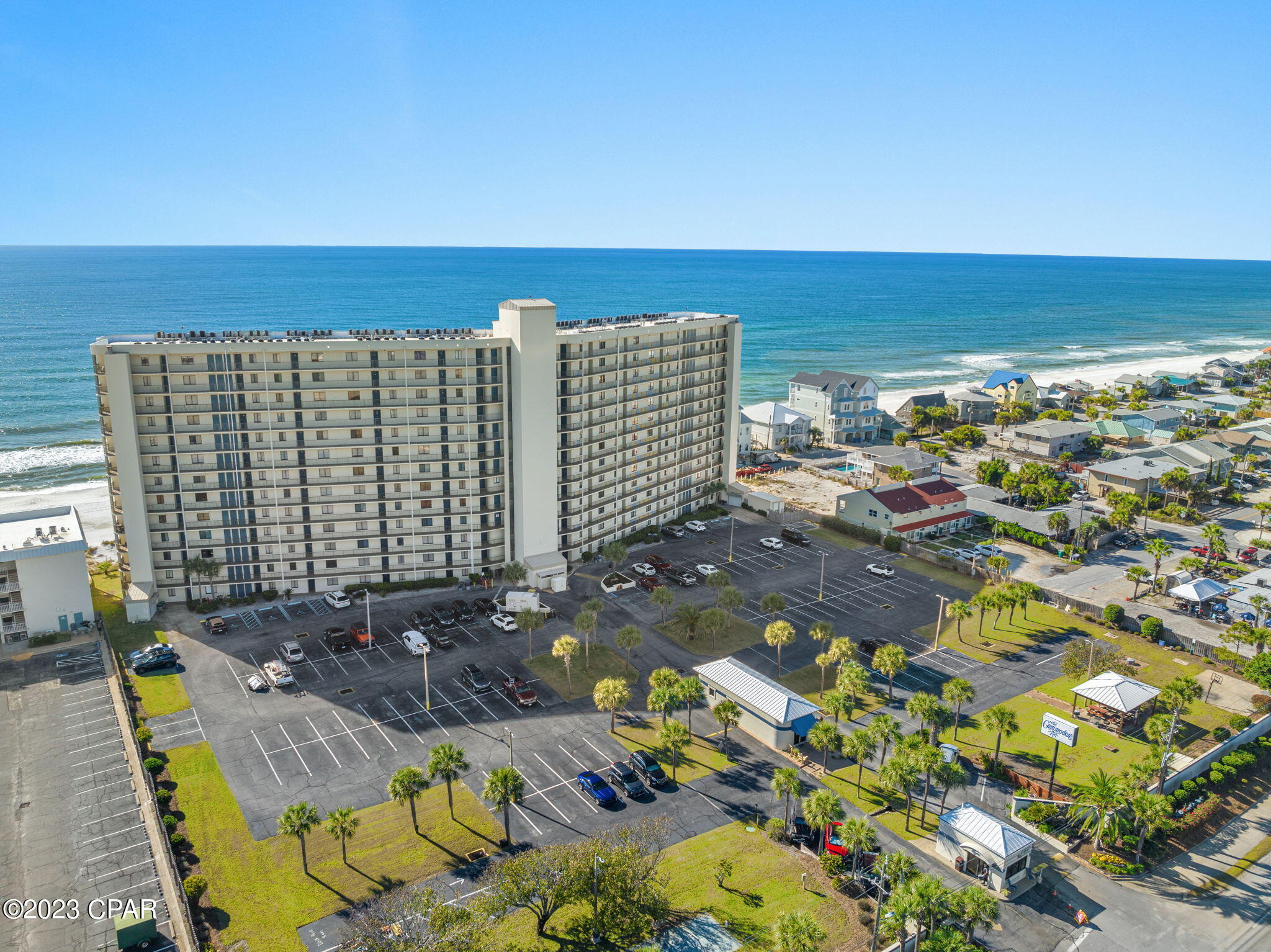 MOTIVATED SELLER - This resort sits on the quiet end of Thomas Dr within walking distance to St. Andrews  State Park.  The 3 bedroom, 3 bath is conveniently located on the first floor which gives you easy access to the pool or beach without waiting for elevators.  Tile floors throughout, large bedrooms two which feature king size beds, and one with two queens. Unit also comes with outside owners closet to store those beach toys! Amenities include large heated pool, kiddie pool, picnic area, shuffleboard/basketball courts. Gated resort with onsite secuity guard. Great potential for investment, full time residence or second home. 
Fully furnished and rental ready this condo is not on the rental program but The Commodore does allow short term rentals.  All Data and Dimensions to be verified by Buyer.